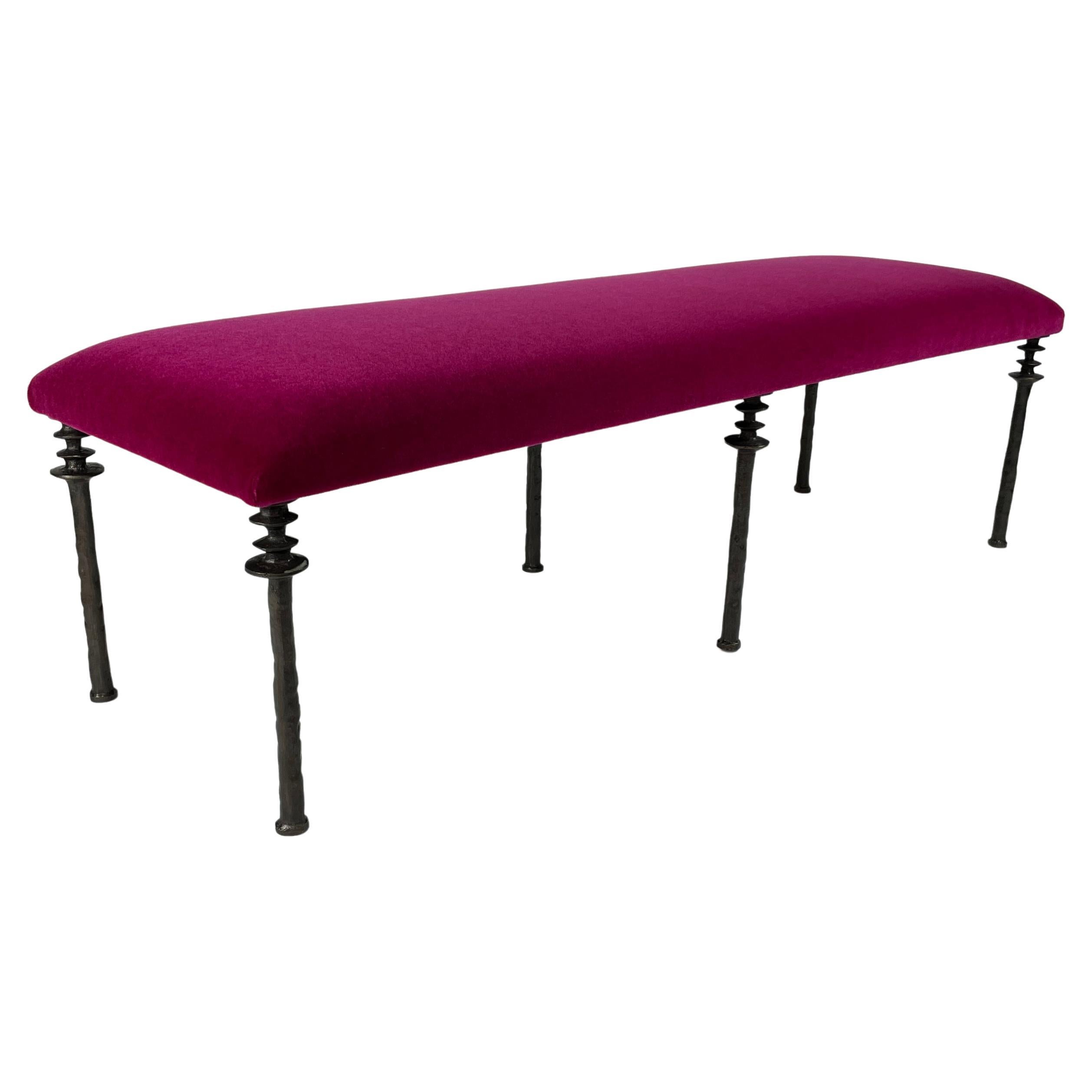 Inspired by Diego Giacometti, this bench is ideal for those who are looking for unique seating. Their cast bronze legs provide a truly organic touch. The cushion has been upholstered in a Pierre Frey Mohair fabric. The seat can be upholstered in a
