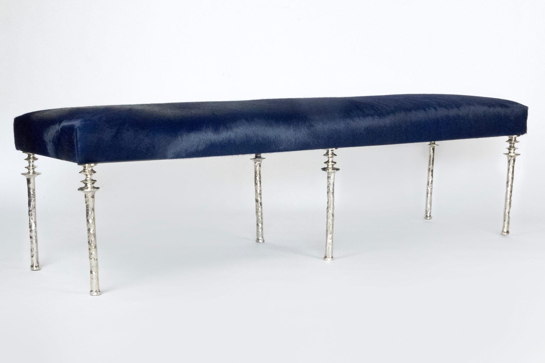 Inspired by Diego Giacometti, this bench are ideal for those who are looking
for unique seating. Their cast bronze legs provide a truly organic touch. The
seat has been upholstered with a black cow hide. Bench is located in our NYC showroom in the