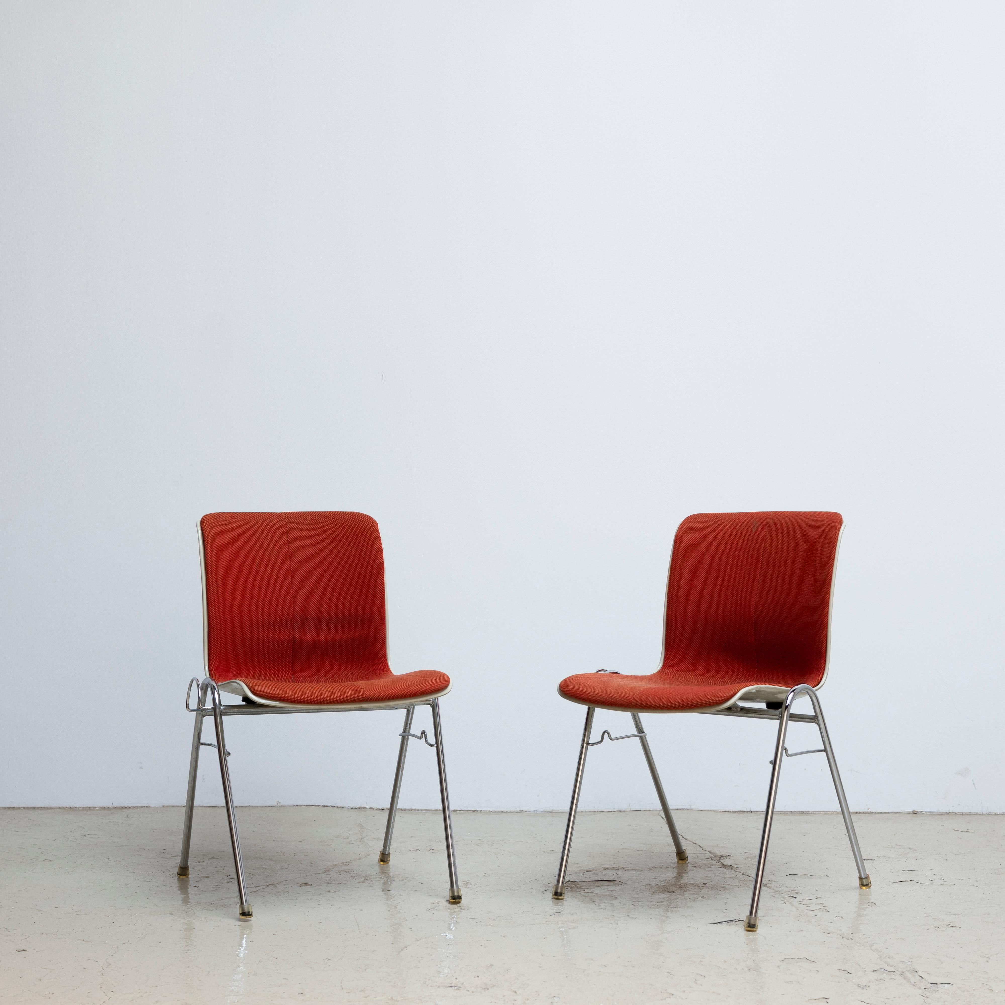Stackable side chairs designed by Sori Yanagi in 1969 and manufactured by Kotobuki. Sold as a pair. Priced in pair.
Upholstery, FRP (fiber-glass reinforced plastic), steel.