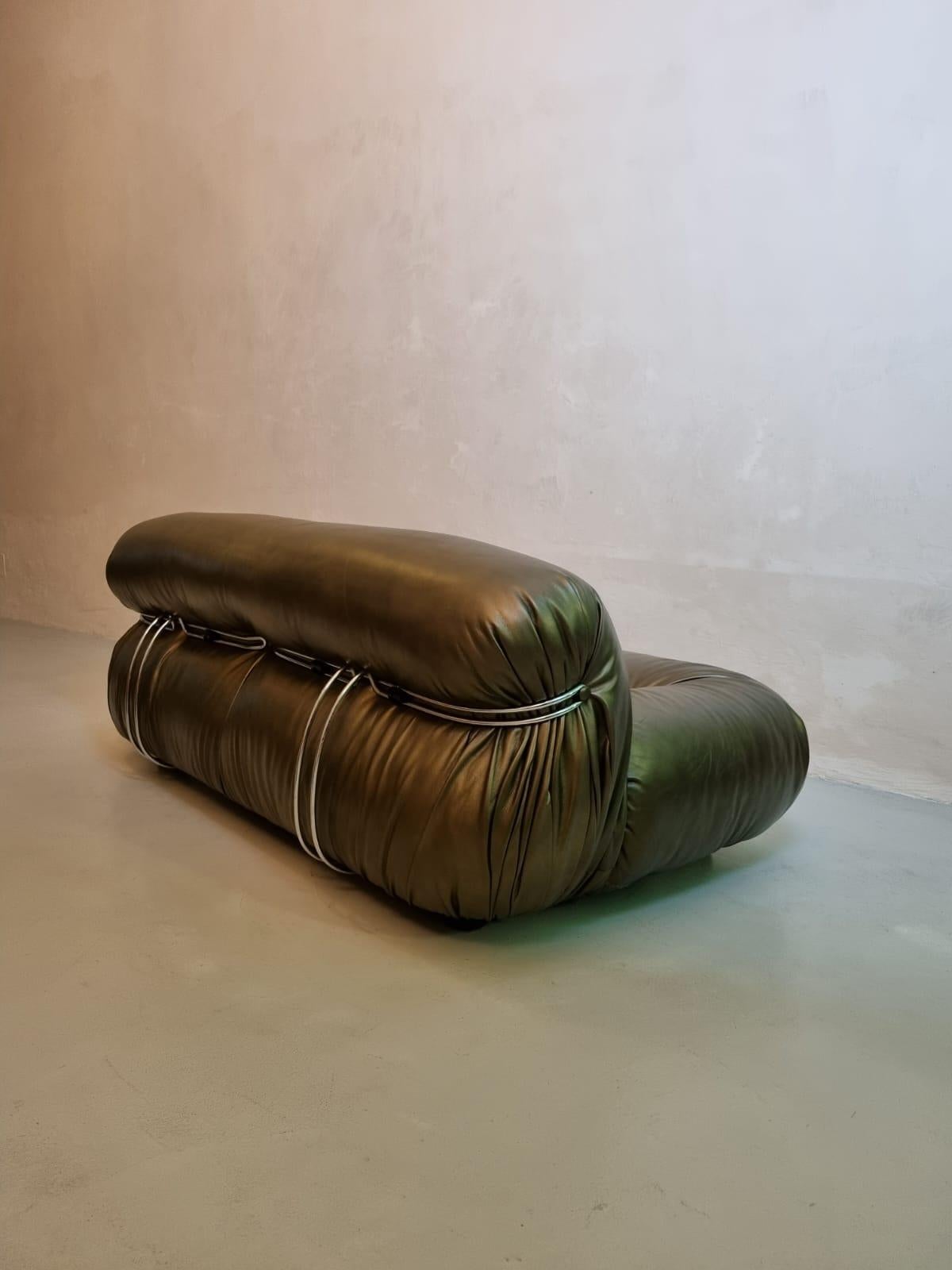Soriana 2 seater by Afra and Tobia Scarpa for Cassina 1969,  reupholstered in  metallic green leather.
A true icon of style, Soriana, characterized by its abundant curves, was designed in 1969 by Afra and Tobia Scarpa and received a Compasso d'Oro