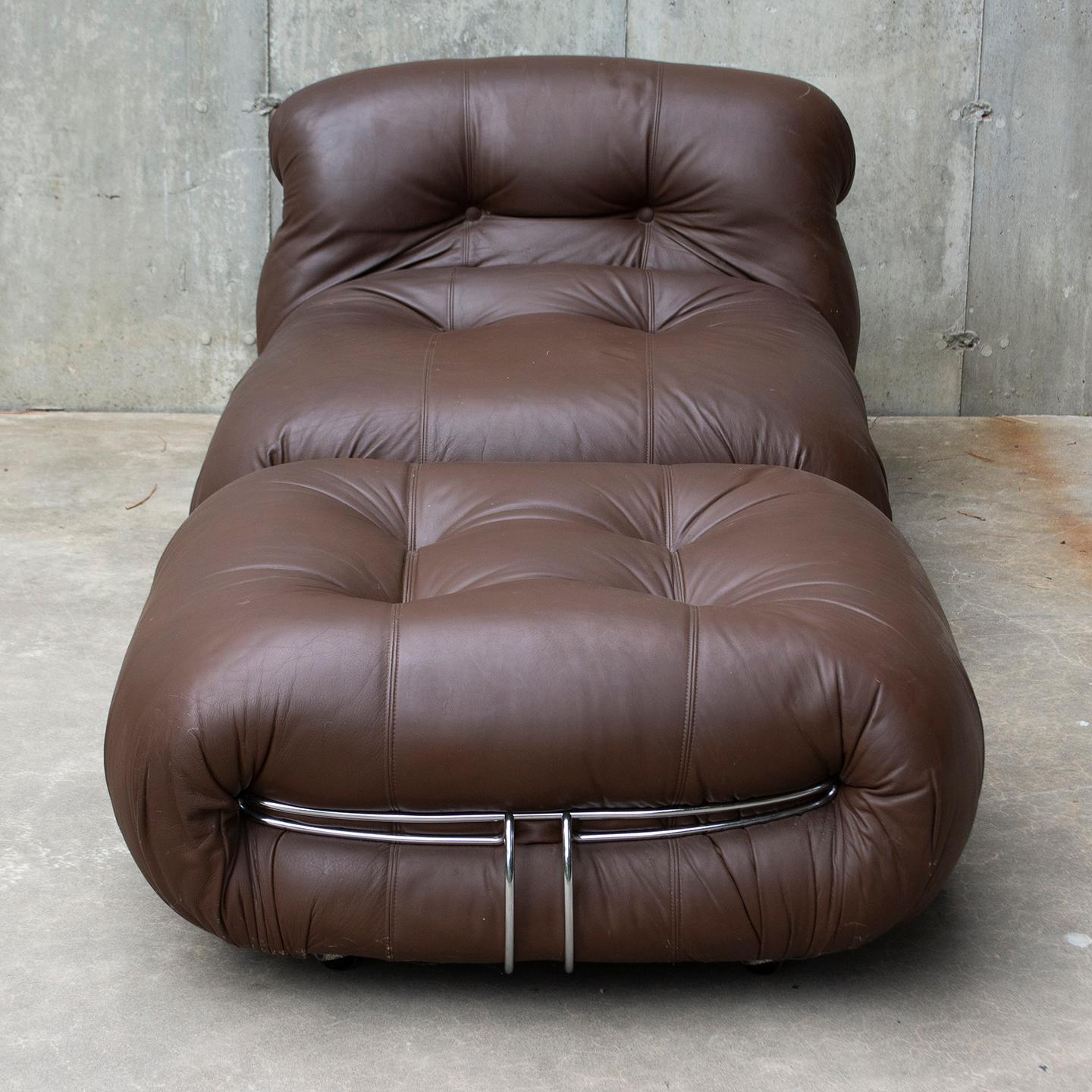 Soriana lounge chair with ottoman by Afra & Tobia Scarpa, made in Italy by Cassina, circa 1970’s. The original rich chocolate brown leather and foam are in great condition and shows its trademark round and bulky shape. The concept behind the Soriana