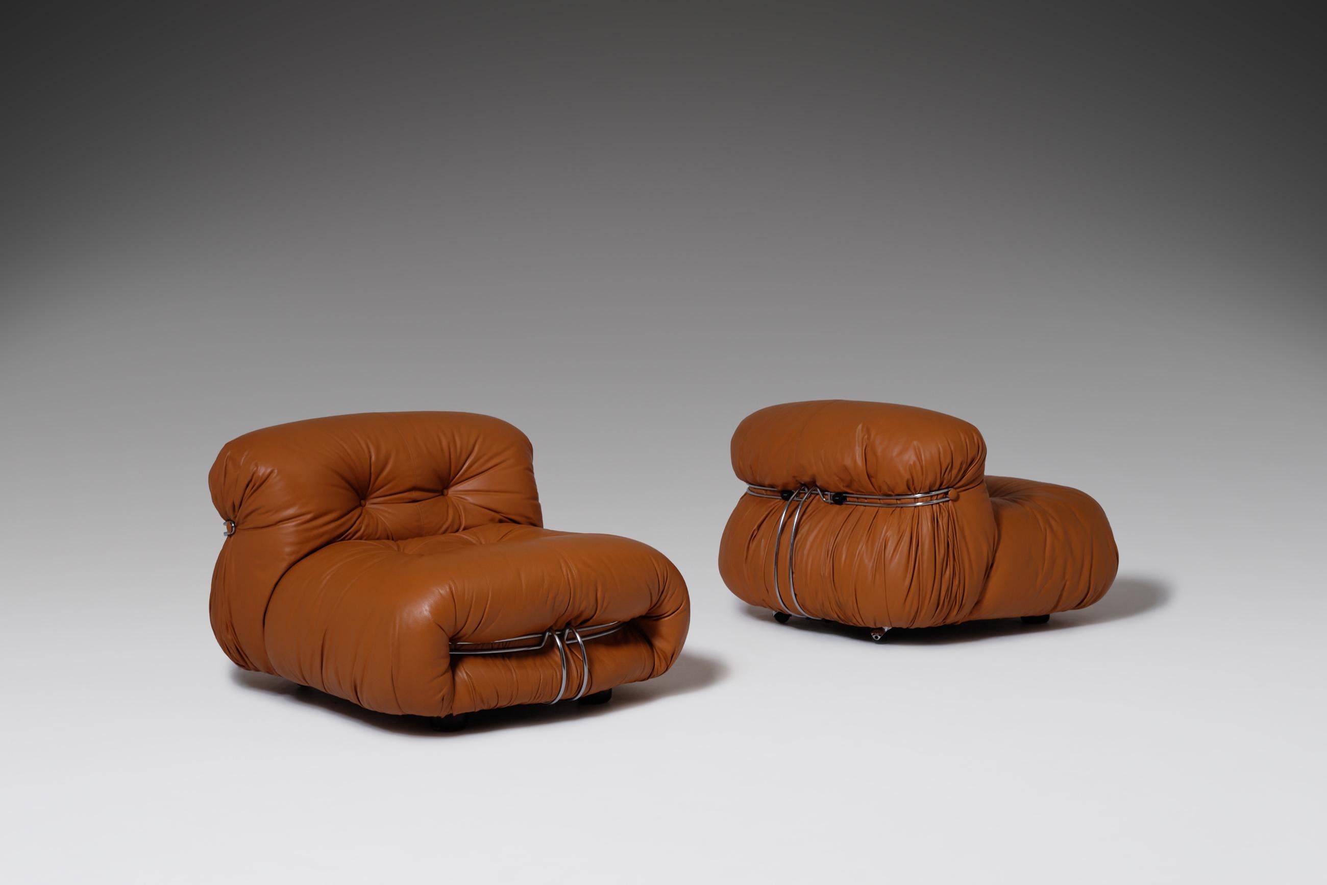 Stunning pair of Soriana lounge chairs by Afra & Tobia Scarpa for Cassina, Italy 1969. The chairs still have their original high quality cognac leather upholstery which give them a rich appearance. The original foam still has it's characteristic