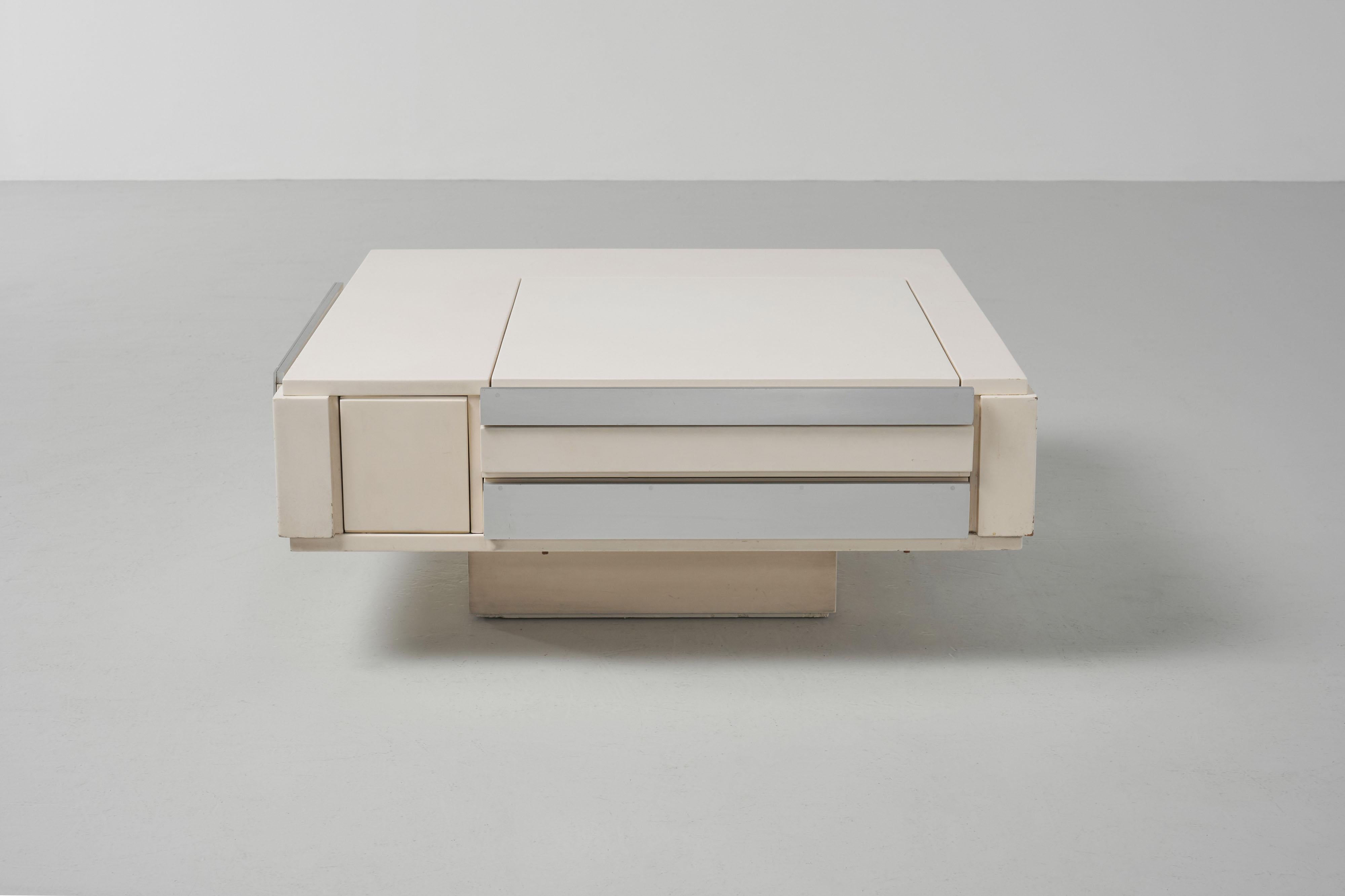 Very nice and versatile dry bar coffee table by Cesare Augusto Nava, Italy 1970. This recognizable almost constructivist coffee table has an amazing design. The piece is different from every side and has many hidden and visible functions. Which