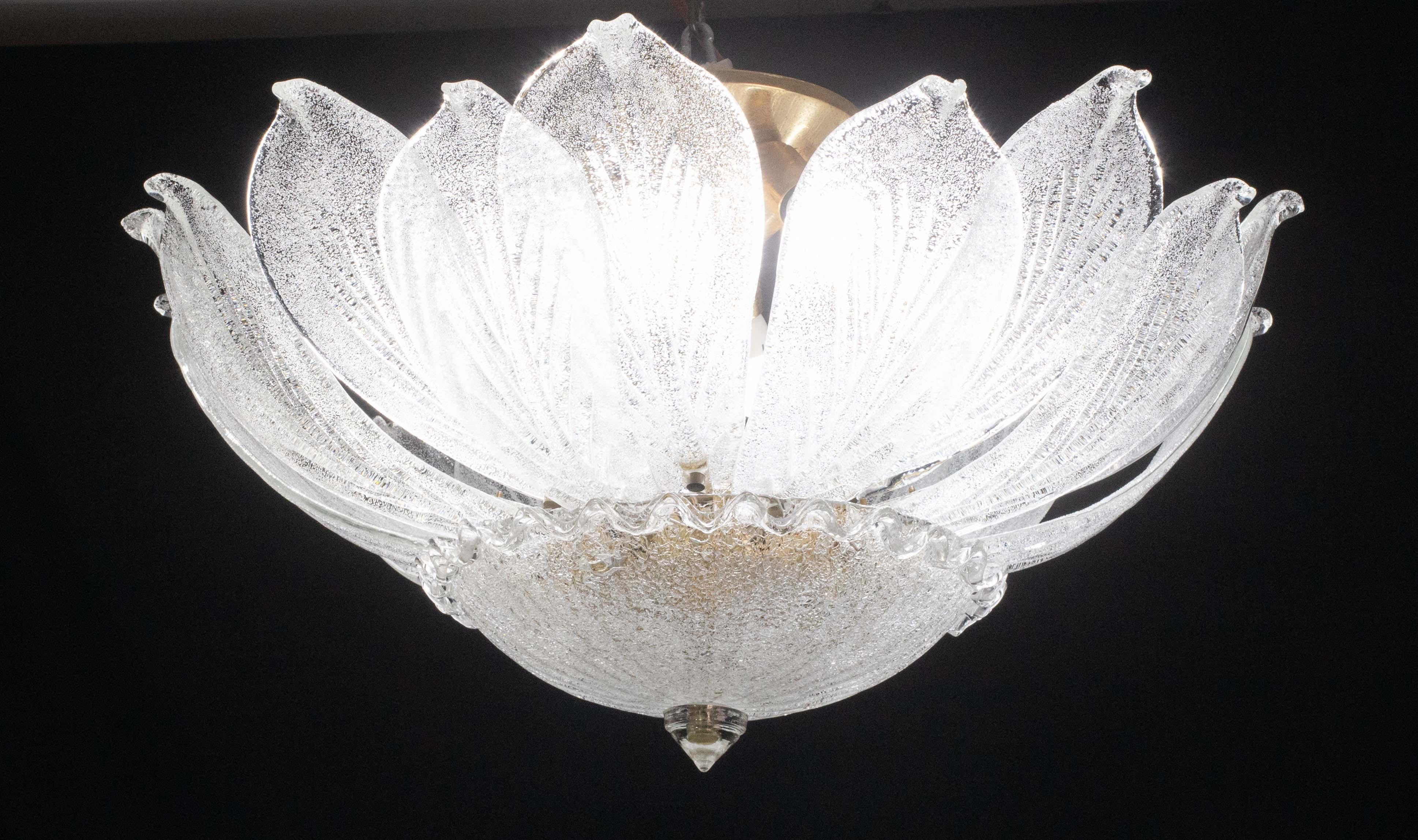 Splendid Murano glass ceiling lamp, perfect for decorating a large space.

Period: circa 1970.

The ceiling light misure 40 cm in height, the diameter measures 70 centimeters.

It mounts 8 lights, possible to switch for Usa standards.

Perfect for