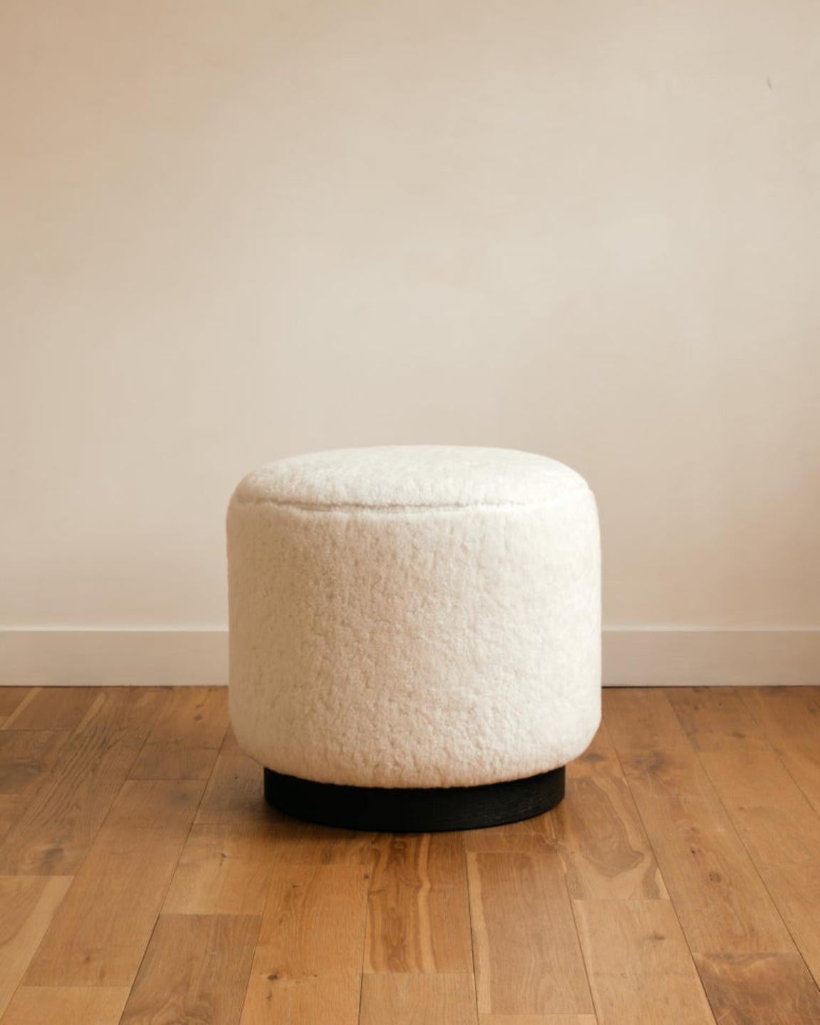 Sorrento Ottoman  by Studio Sam London
Dimensions: ⌀ 52 x H 47 cm
Materials: Sheepskin and Stained Timber Basel


Founded in London by its Creative Director Alessandra Melchiorri, Studio Sam creates furniture pieces with a unique identity.
Every