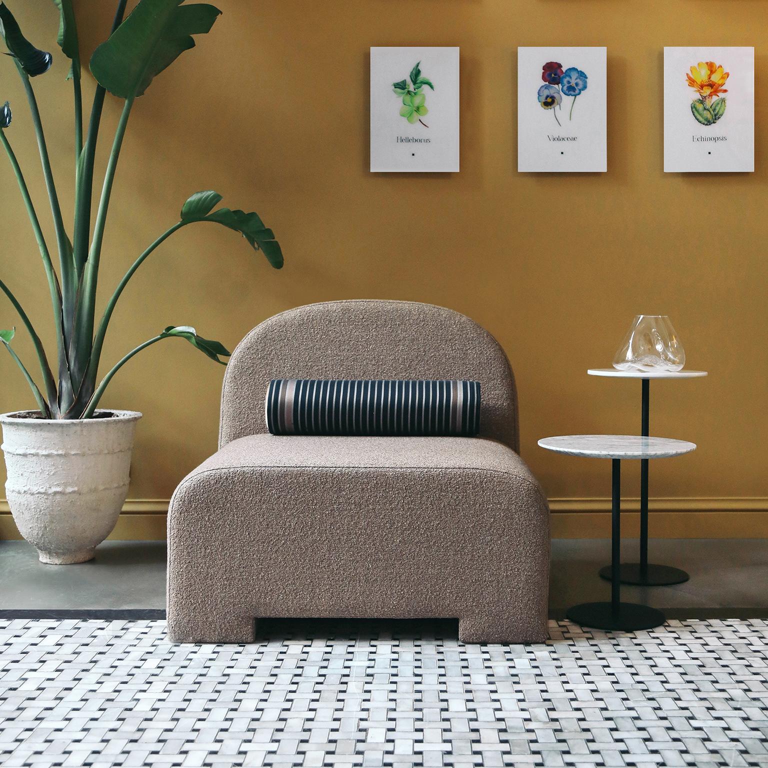 Sosa armless chair by Lagu
Designed by Ufuk Ceylan
Dimensions: W 90 x D 85 x H 80 cm
Materials: Bouclé, Fabric, Foam, Hardwood.

Standing out with its round details and upholstery covering its entire surface, Sosa Sofa is coming to your living