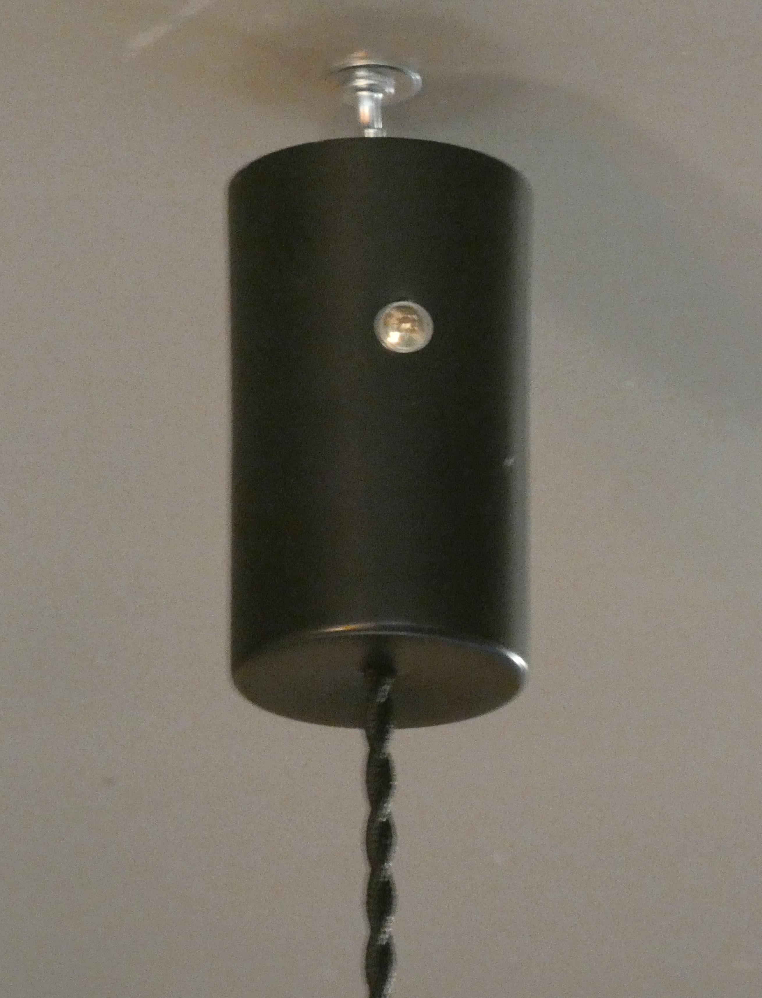 Mid-century Modern pendant lamp in Scandinavian style.
Attributed to Stilnovo Italia, it was produced in the 1960s.
The white top dome and end cylinder as well as the large red ring are made of polished acrylic material and are connected by brass