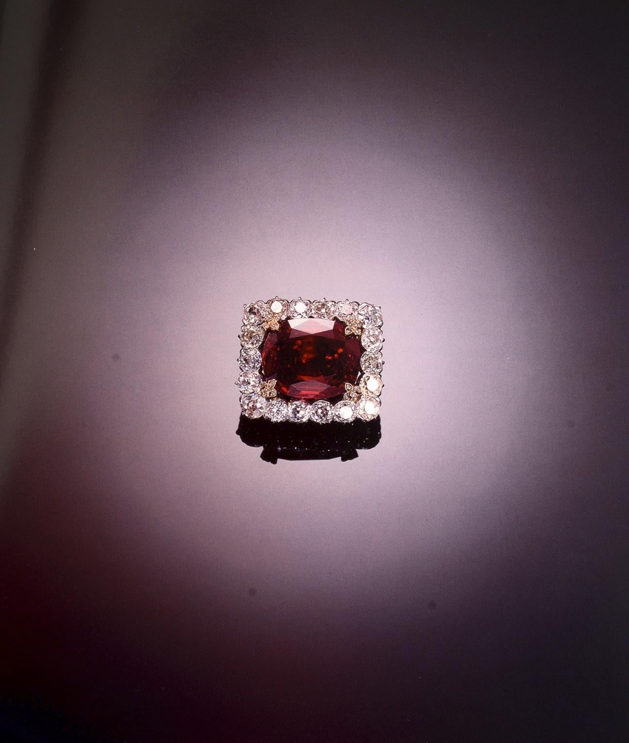 Sotheby's Catalog: The Mandalay Ruby October 1988. First edition softcover. Extremely well described with the historic background. A superb ruby and diamond ring, mounted by Raymond Yard. Set with an oval ruby weighing 11.88-carat, to the shoulders