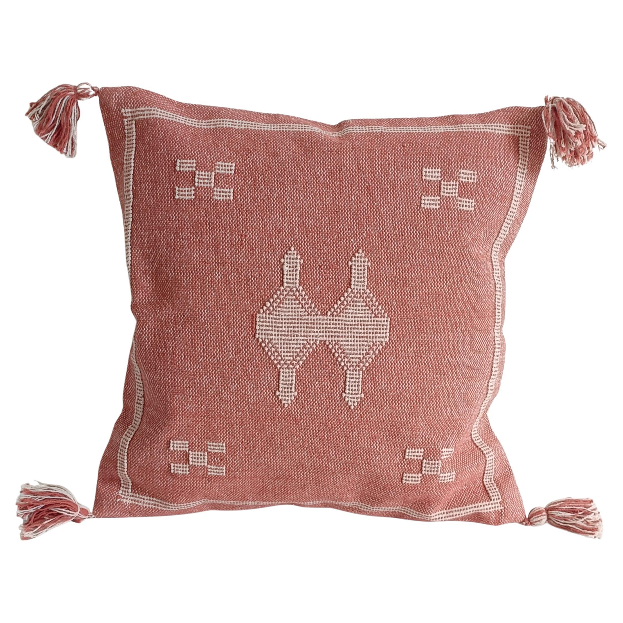 Cojín de lino marroquí en telar manual rosa y crema estilo Sotogrande