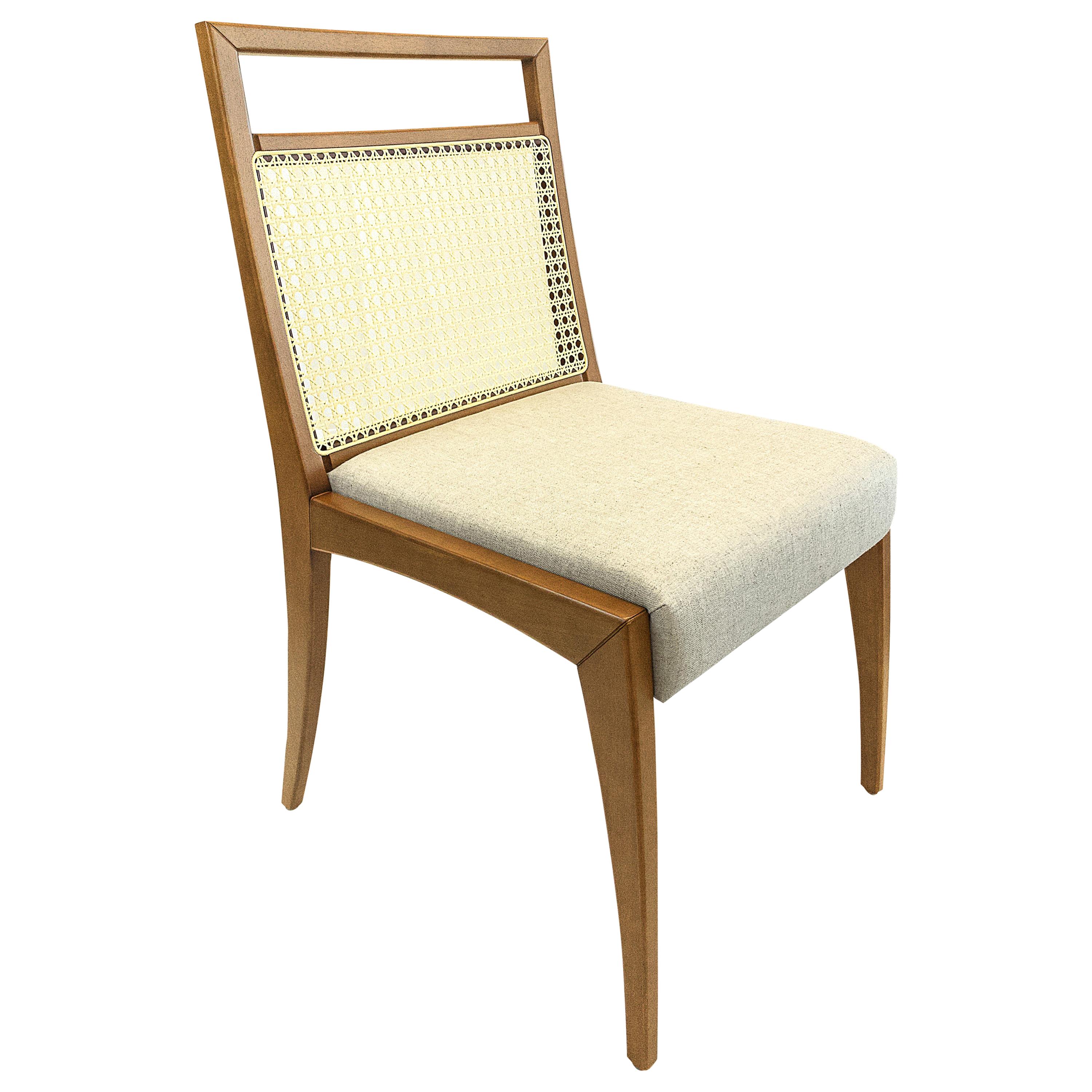 The sotto is a solid wood dining chair frame featuring a stunning cane-backing partnered with an open top rail. 