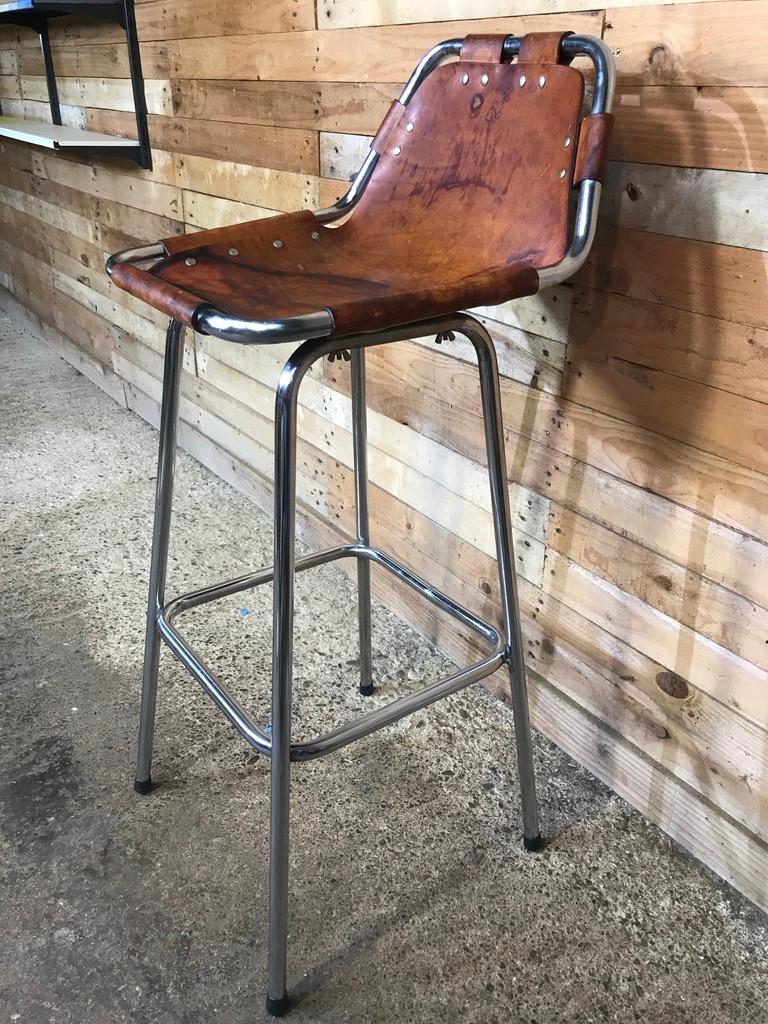 
Sought after leather Charlotte Perriand Stool for Les Arcs, 1960. 

Charlotte Perriand stool, stunning stools very unusual and sought after, 

stunning stools very unusual and sought after, these were selected by Charlotte Perriand for and used in
