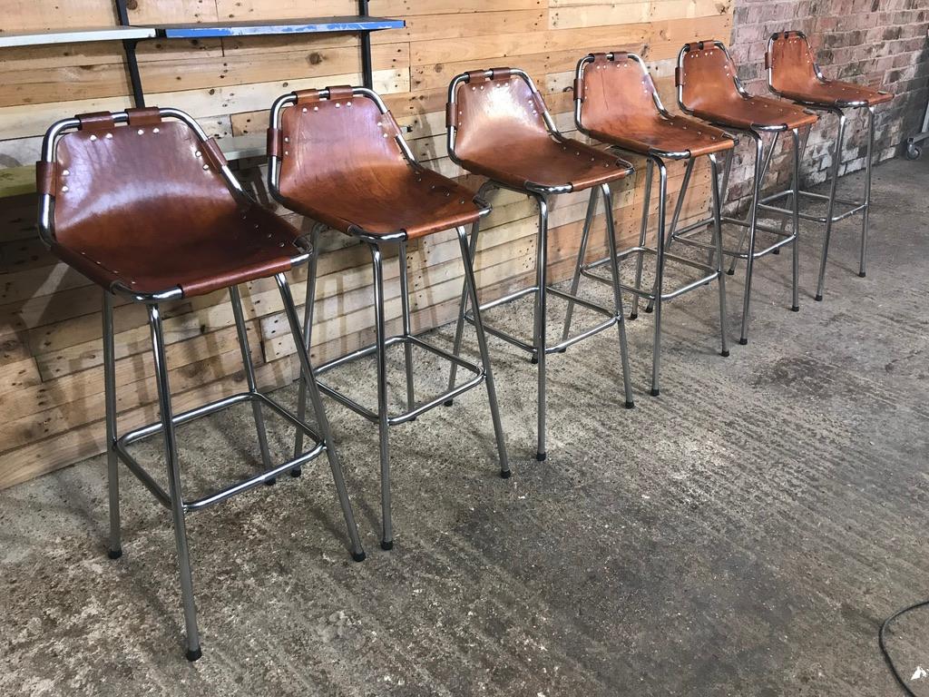 These are the rarest tallest stools by Charlotte Perriand available!

Sought after six leather Charlotte Perriand stools for Les Arcs, 1960.

Six Charlotte Perriand stools in France, stunning stools very unusual and sought after, designed by