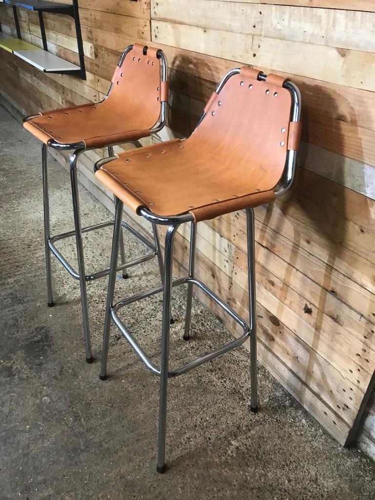 These are the rarest tallest stools by Charlotte Perriand available!

Sought after 3x leather Charlotte Perriand Stools for Les Arcs, 1960. 

Two Charlotte Perriand stools in France, stunning stools very unusual and sought after, designed by