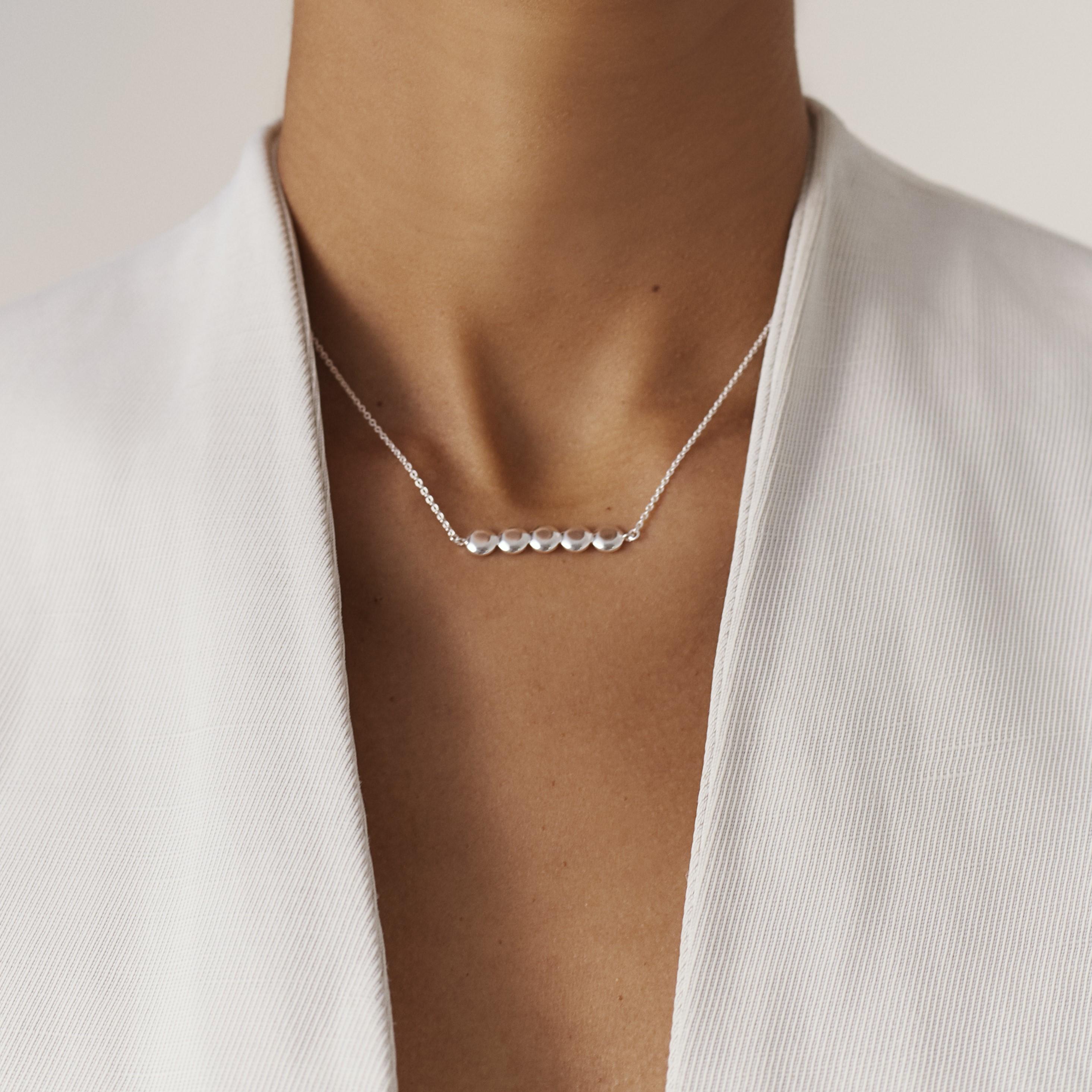Also available in recycled 18k gold.

SOUL ALONE necklace in the purest recycled silver, adorned with five silver diamonds. A modern classic, this understated fine necklace is sure to become a favourite choice with any style of outfit.

THE KINDRED