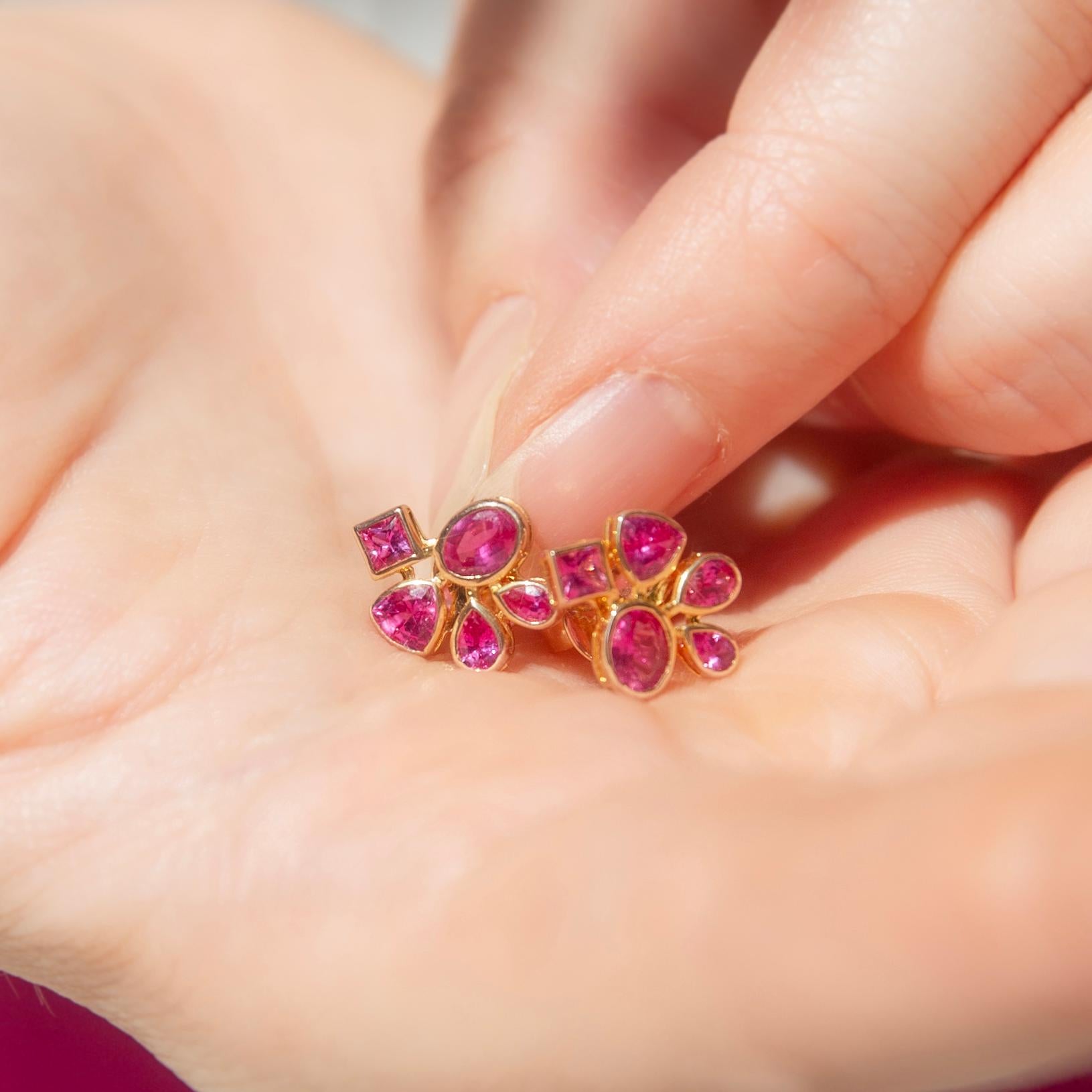 SOUL COLOUR

My soul colour is fuchsia
My soul dances
It laughs and cries
In fuchsia

Soul Colour Gem Details
The ten faceted bright vivid pinkish red rubies are in the shapes of oval, pear, cushion and trilliant.

Size
Each earring measures