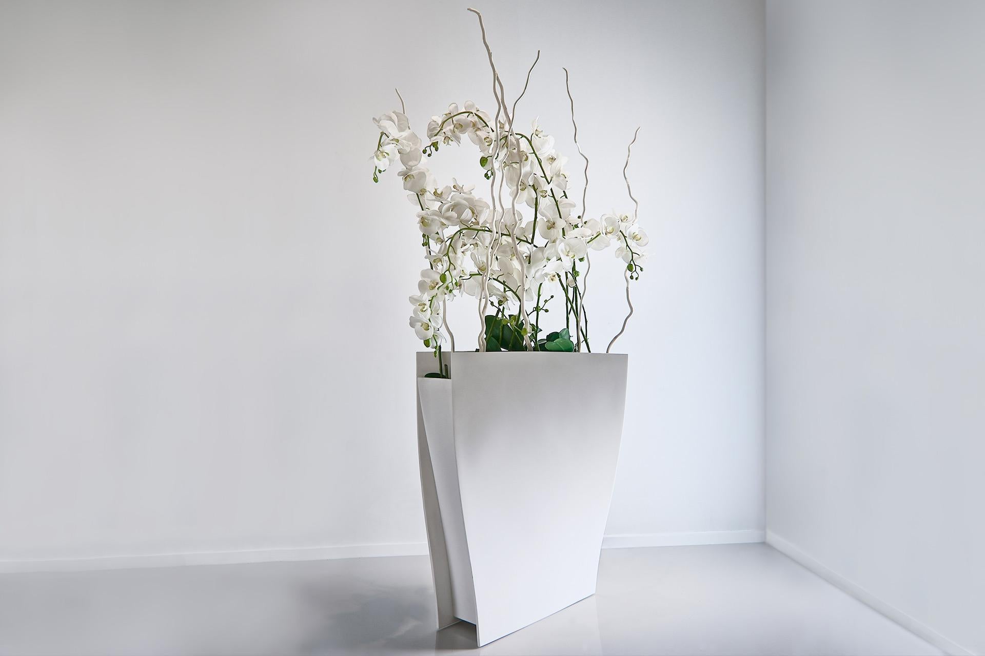 Soul Sculpture Plant Holder by Veronica Mar
Dimensions: D48 x W60 x H90 cm
Materials: White KRION®

SOUL SCULPTURE Plant Holdercan be a bespoke piece.Other colors in KRION® have different prices.

Inspired by the spiral movement can be