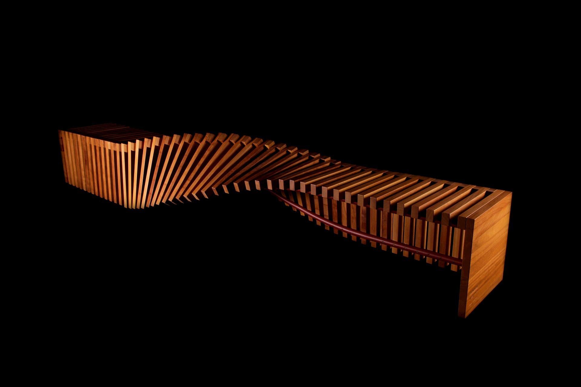 Soul sculpture wood bench large by Veronica Marli
Dimensions : D 300 x L 72 x H 58 cm. SH : 45 cm.
MATERIAL : Bois d'Iroko

Il est disponible en 2,5 mètres et 3 mètres de long, fabriqué en KRION® en édition limitée. Les différentes couleurs de