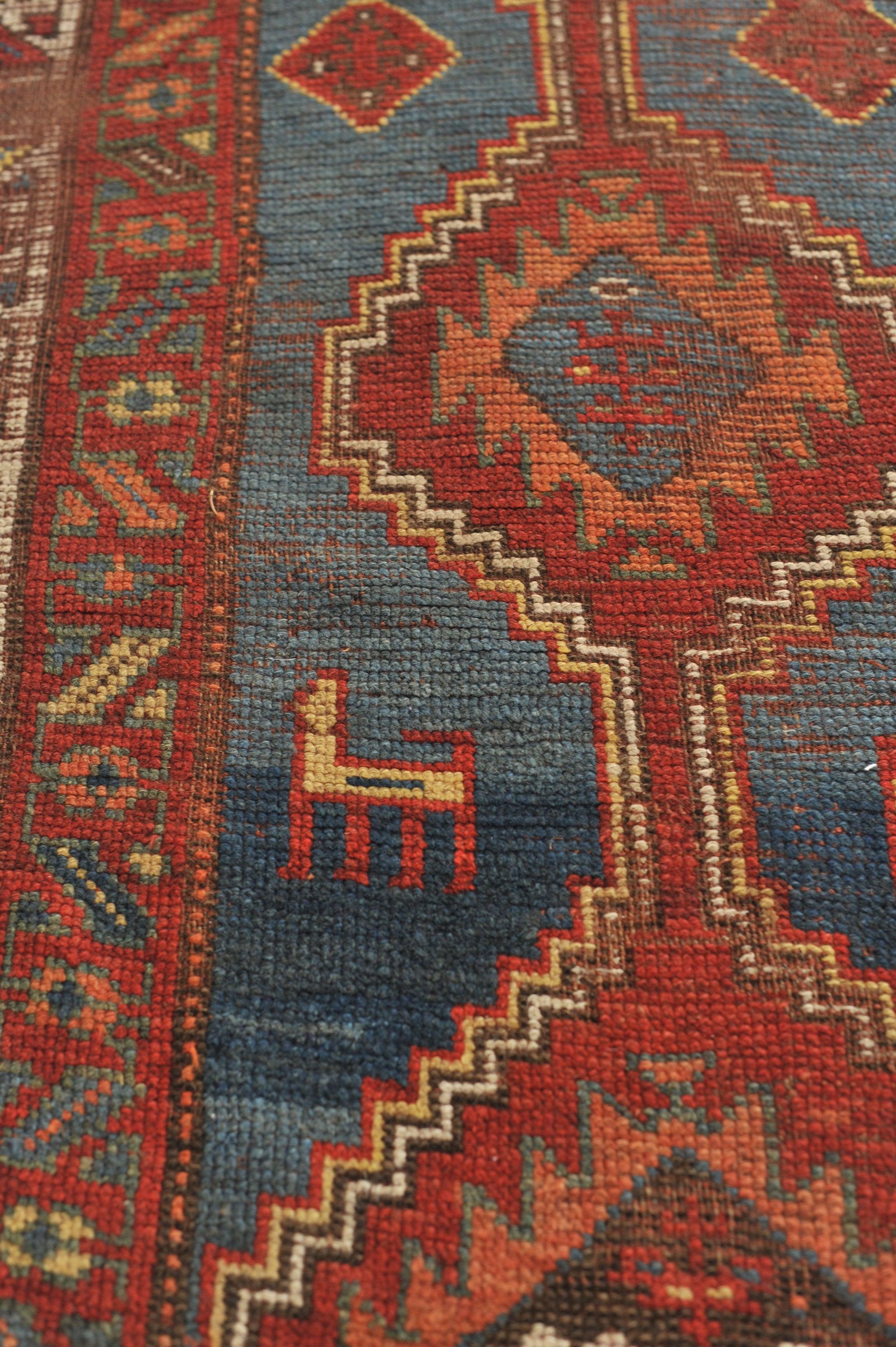 Uma Soulful Nomadic Antique Runner 

About: How can a piece get so soulful? What makes a rug endlessly gorgeous? You look at this rug and you get teleported back to a village in the remote regions near the mountains. You can see the goats and sheep