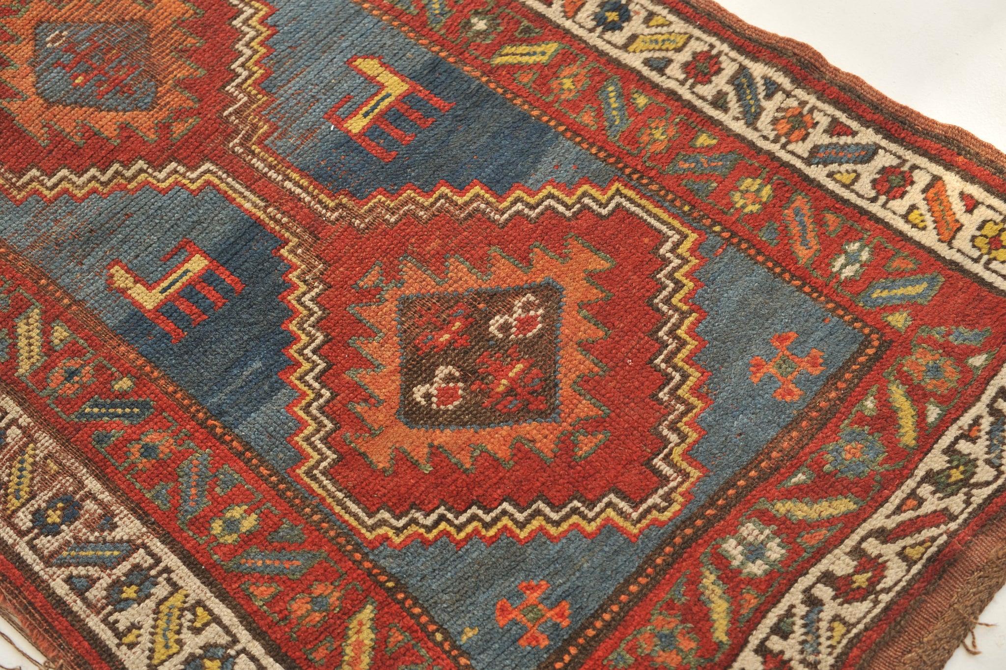 Early 20th Century Soulful Nomadic Antique Kurdish Runner with Mystical Animals For Sale