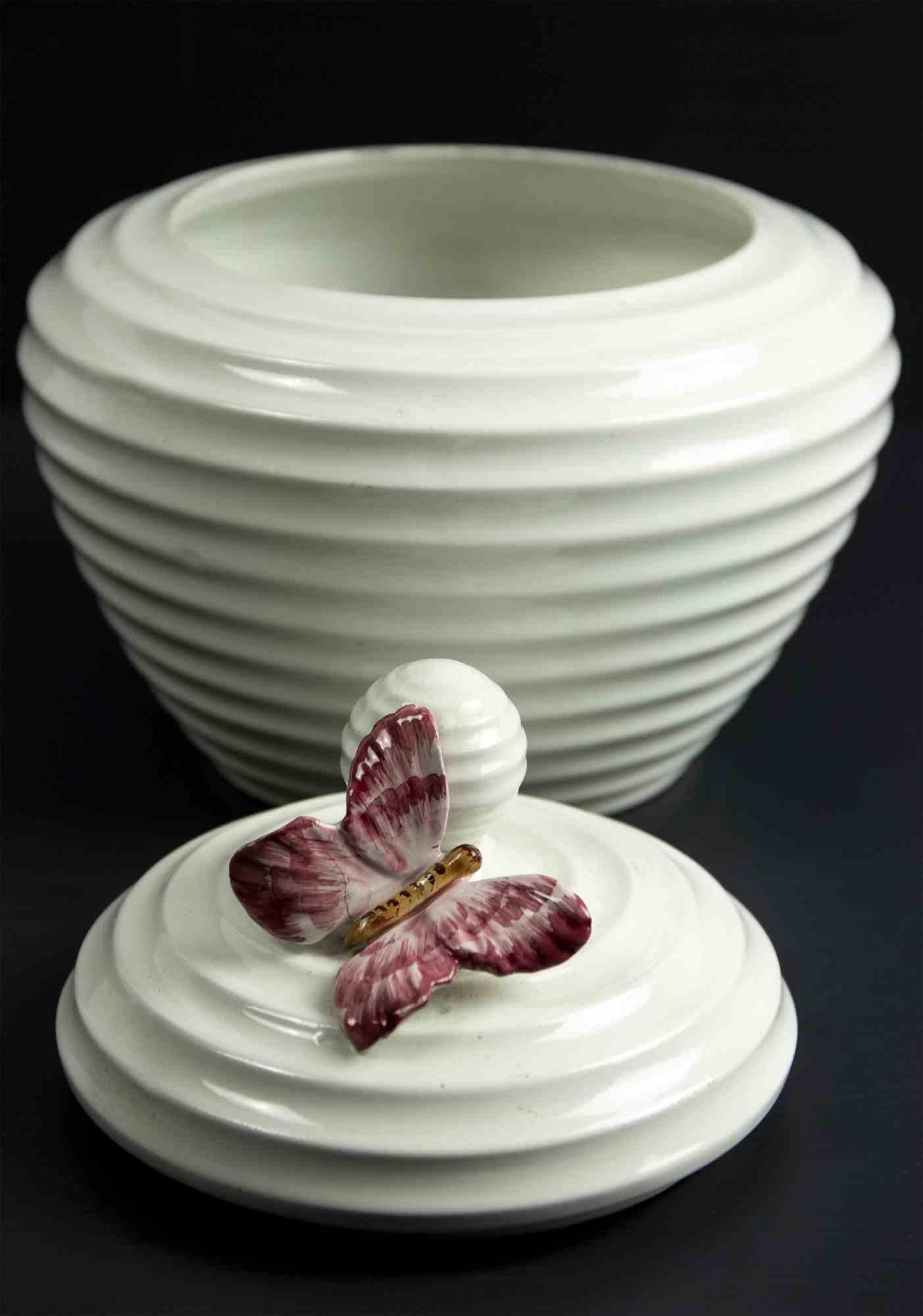 Soup bowl is an original decorative object realized in the mid-20th century in Bassano del Grappa.

A vintage soup bowl decorated with a hand-made butterfly. 

White ceramics. On the base of the work the label 