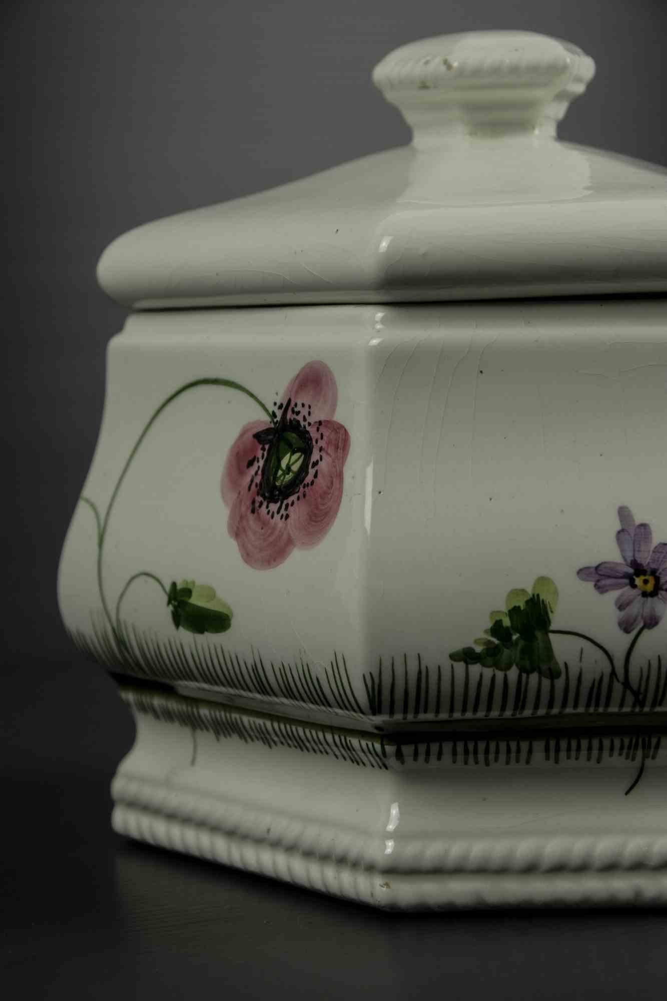 Soup bowl is an original decorative object realized in the mid-20th century.

Original ceramics. 

Hand-made and hand-colored.

Made in Italy.

The bowl is decorated with flowers and ears of wheat.

Total dimensions: 17 x 20 x 17