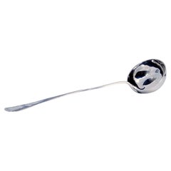 Soup ladle in guilloche silver on the handle with palm surrounding monogram card