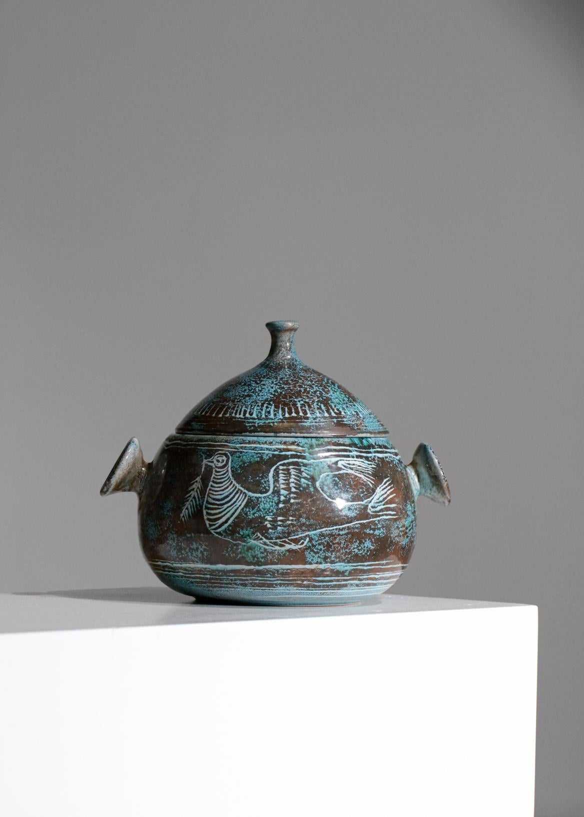 Ceramic tureen from the Yvon Roy Montgolfier workshop in Durtal. Glazed ceramic in blue, bronze and green colours, decorated with a beautiful bird design and geometrical motifs of tribal inspiration. Very good general condition, presence of the