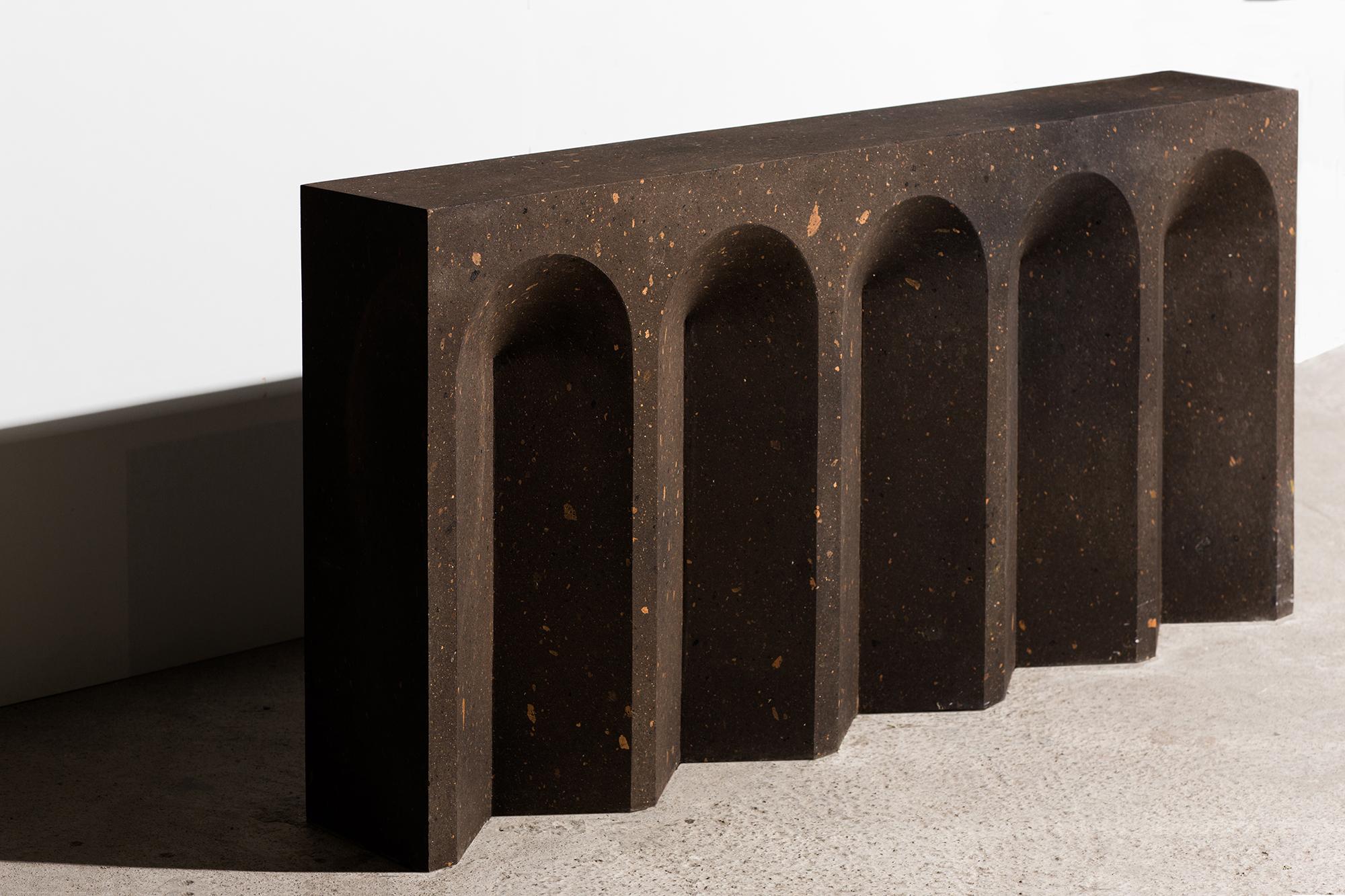 Source console table No.2 is handcrafted from black tuff in a limited edition of 10, and comes with a “Certificate of Authenticity”.

Source is a collection of sculptural interior objects inspired by antiquity, architecture, craftsmanship, and