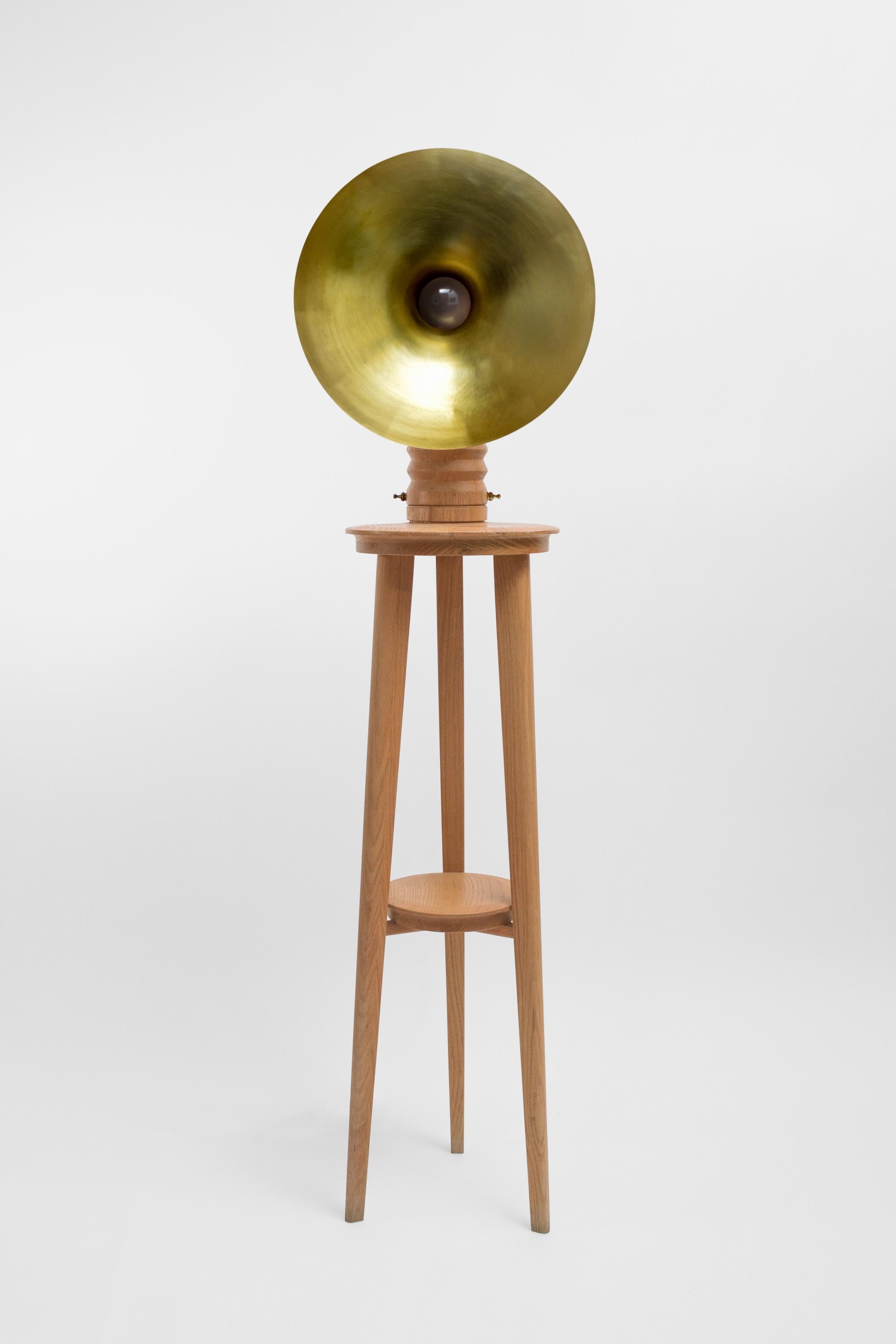 Sousaphone floor lamp by Acoocooro
Dimensions: W 40 x D 29 x H 152 cm.
Materials: Two-tier solid oak wood tripod; copper or brass screen, and resin difuser; and brass accents and lightswitch.

All our lamps can be wired according to each