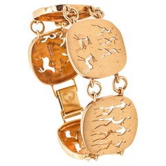 Sudáfrica 1970 Pulsera con antiguos motivos de Tribal Art en oro amarillo macizo de 9 quilates