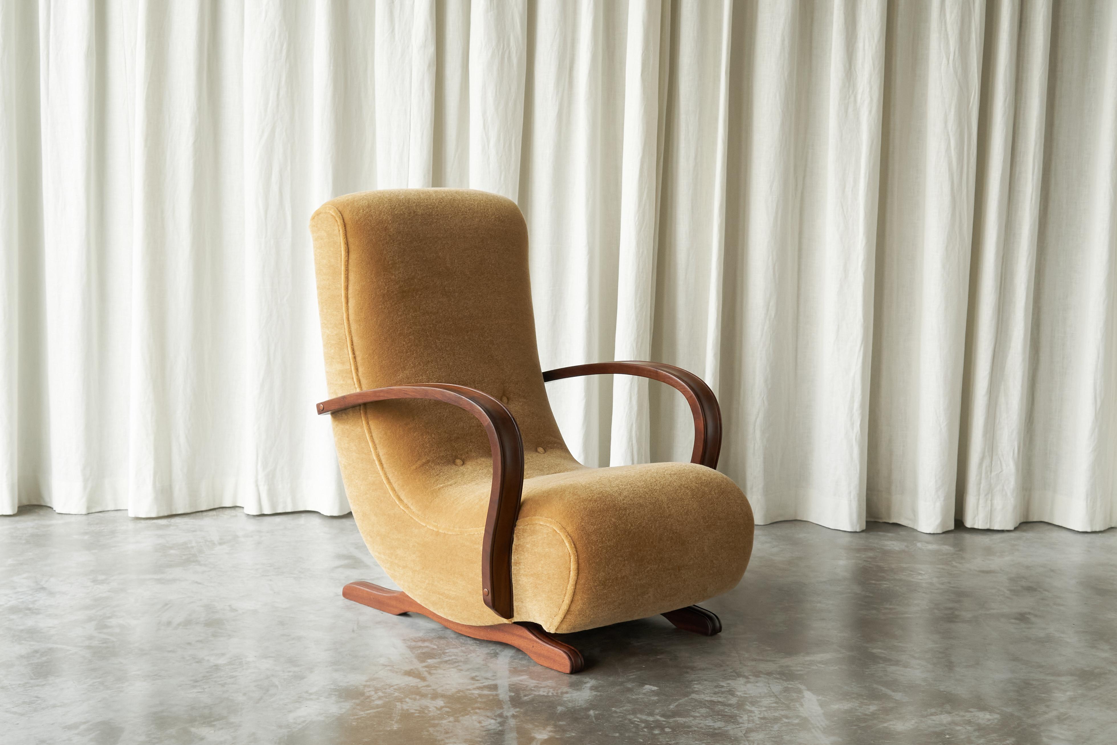 South African Cabinetmaker Rocking Lounge Chair in Mohair and Solid Wood 1930s.

It is not very often you come across something as special as this rocking chair. A unique piece, made by a skilled South African cabinetmaker. It was bought from the