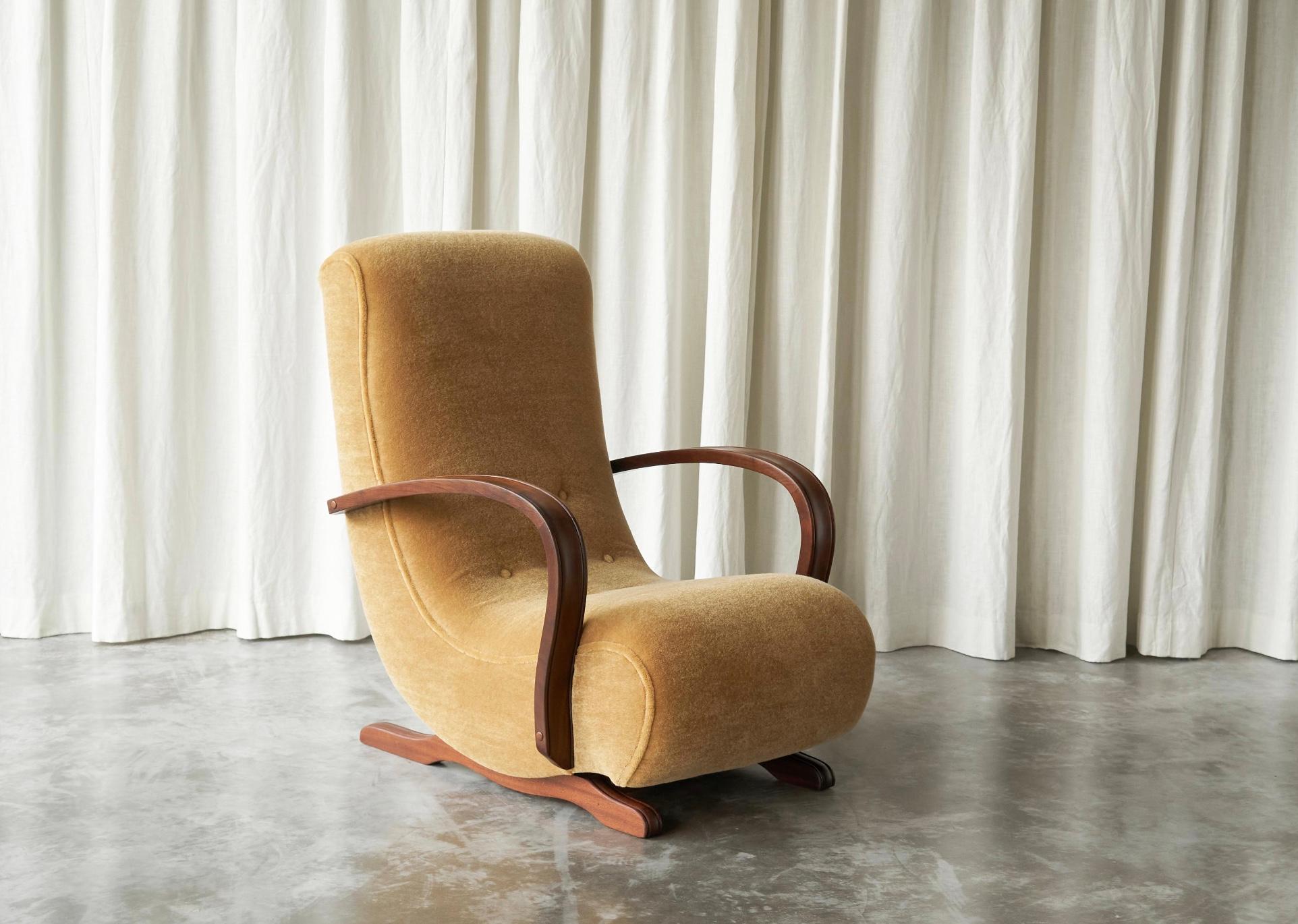 South African Cabinetmaker Rocking Lounge Chair in Mohair and Solid Wood 1930s.

It is not very often you come across something as special as this rocking chair. A unique piece, made by a skilled South African cabinetmaker. It was bought from the