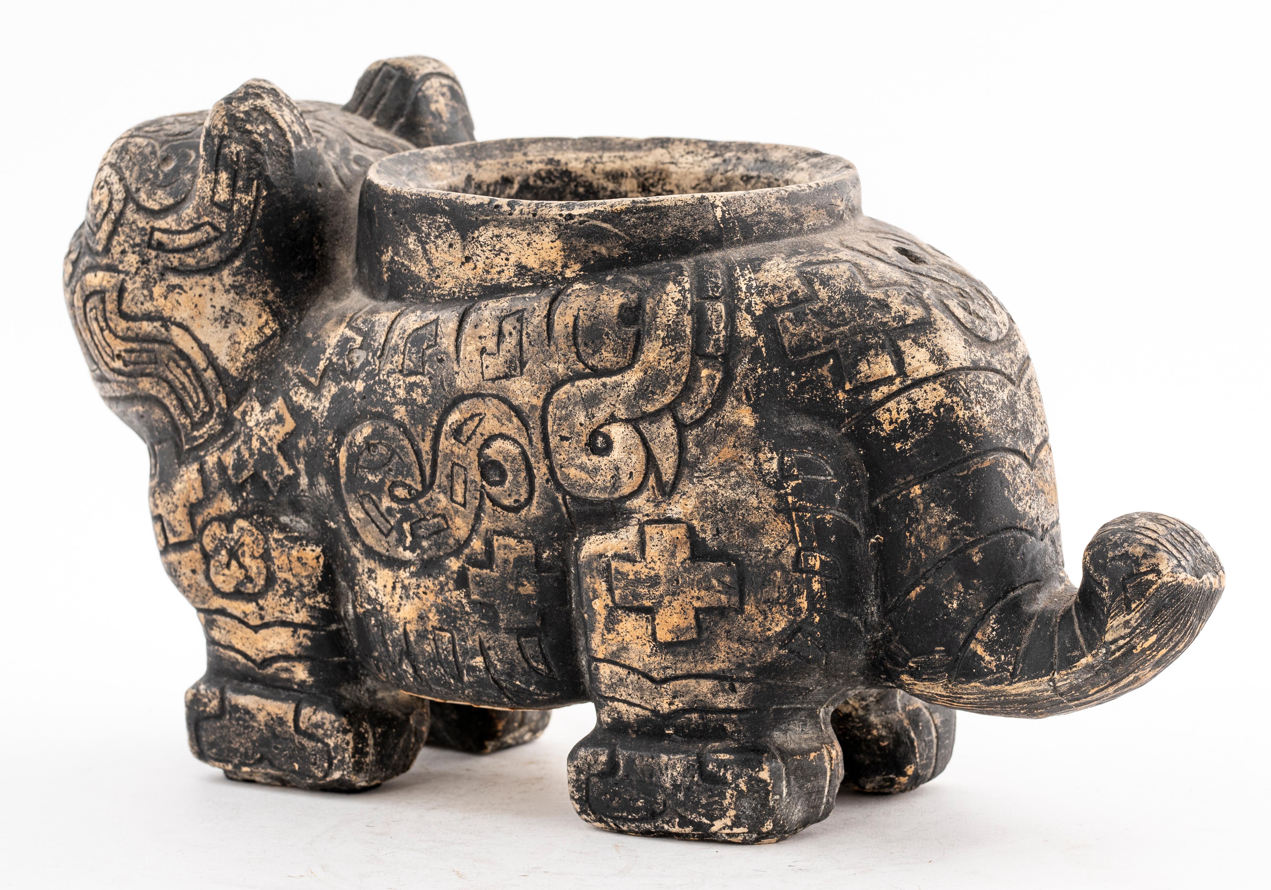 Reproduction of a South American jaguar effigy vessel from the Chavin culture in plaster. This vessel is based upon the original, found in Penn Museum, Philedelphia, PA. Provenance: Removed from a 983 Park Avenue estate.

Measures: 7.25
