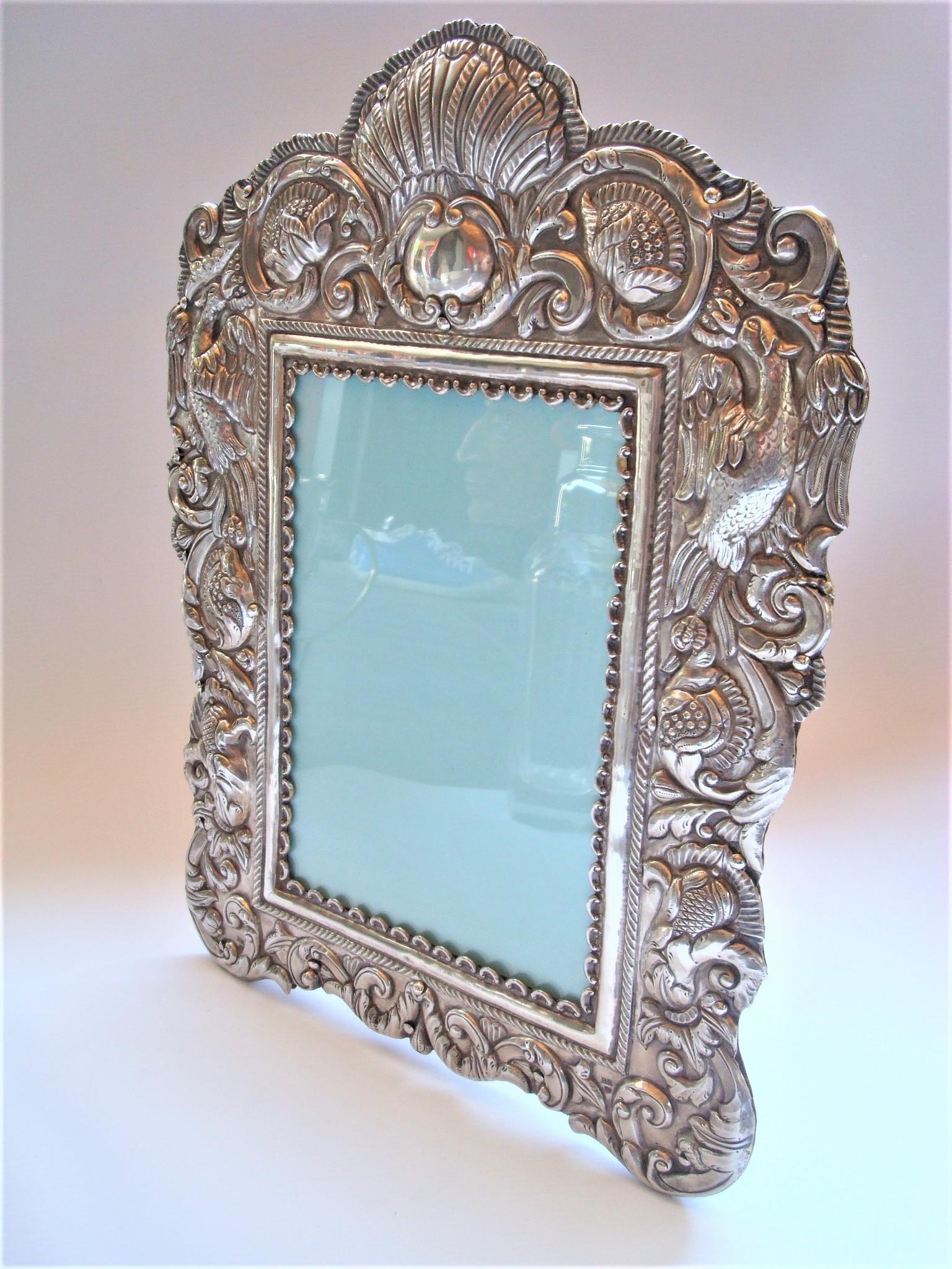 South American sterling silver hand made / Embossed picture frame / mirror 1940´s. Marked hand-made and 925 (it´s the sterling mark in south america).
Perfect for any Mexican Style house.
As for the size it has, it can be used as a picture frame,
