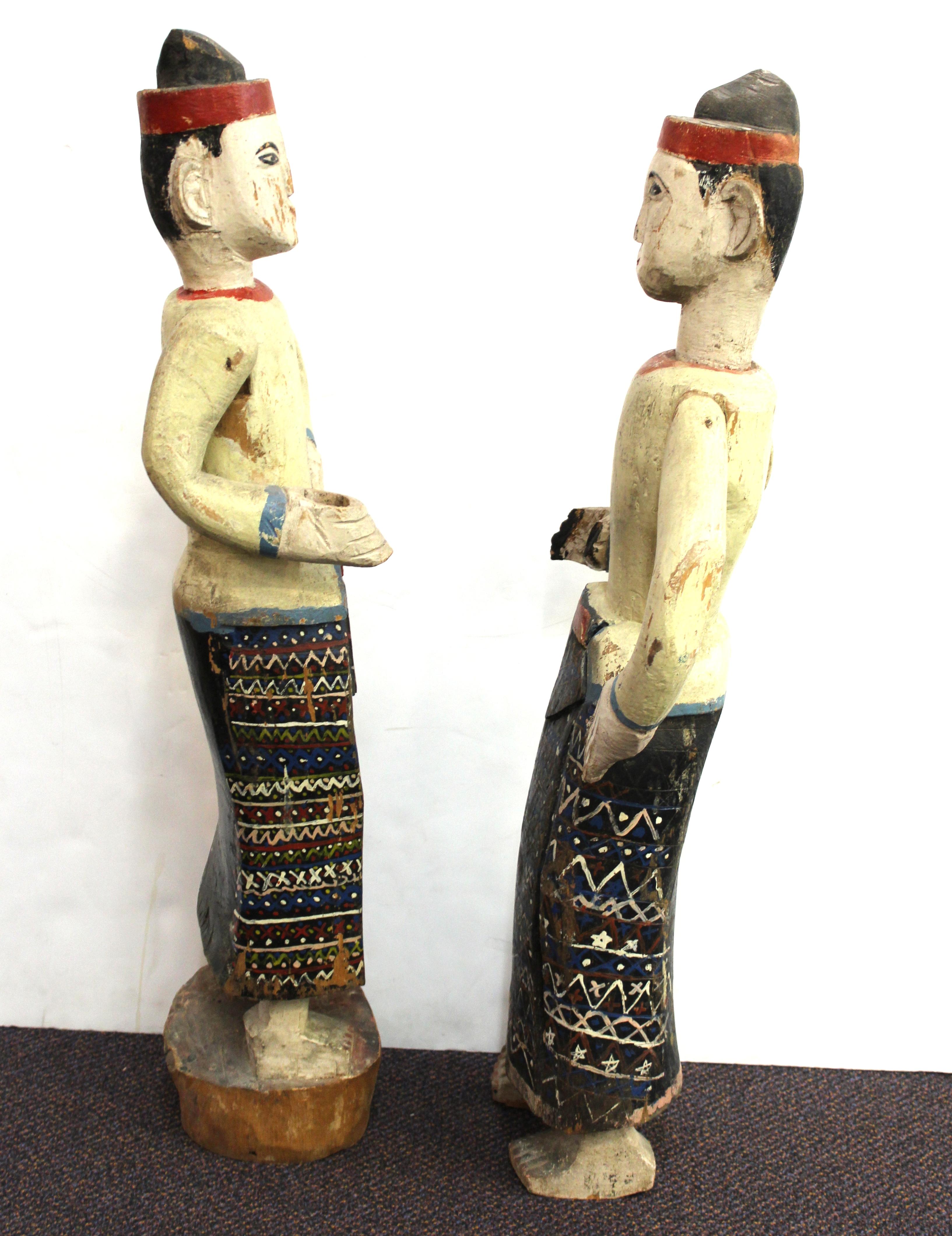 Hand-Painted South-East Asian Carved and Painted Wood Figures of Men in Sarongs