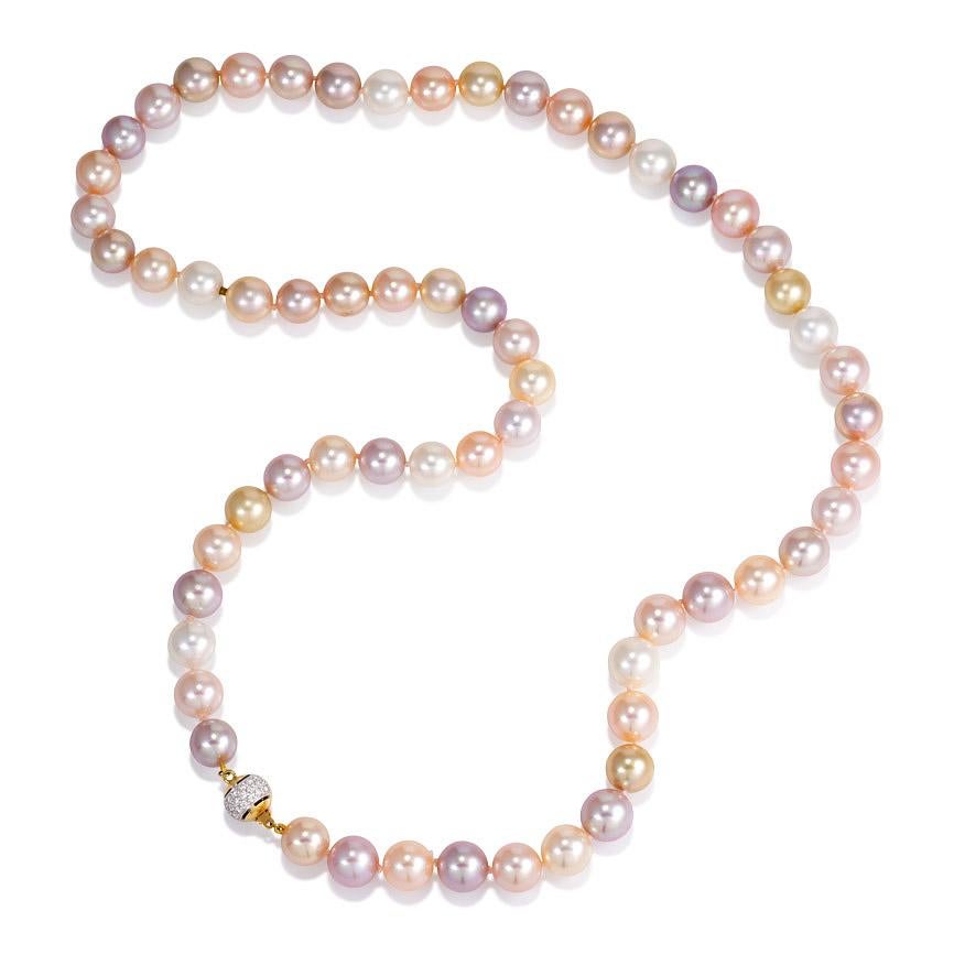 Two nesting strands of South Sea and freshwater pearls consisting of 61 and 65 pearls, respectively, in white, yellow, pink, and lavender tones, with two mystery clasps and an 18k gold and pavé diamond ball clasp.  Atw diamonds 0.60 ct.  Pearls  9.7