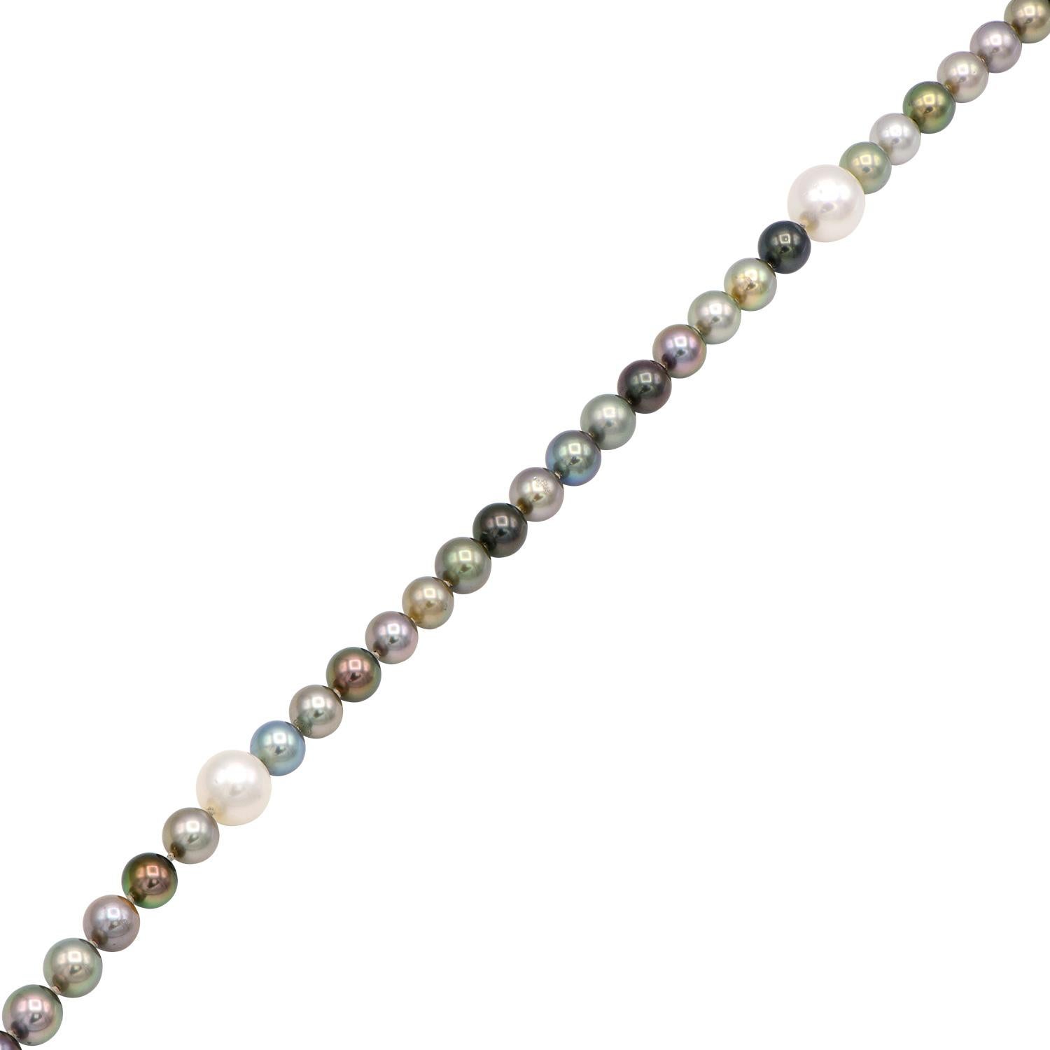 This beautiful pearl rope necklace is made from 130 pieces of South Sea and Tahitian Pearls. The pearls in this 57 inch rope necklace vary in size and color to show all the pearls natural beauty. There is a range from 9-15mm pearls in various shades