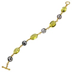 Perles grises baroques des mers du Sud et quartz citron en or 22 carats