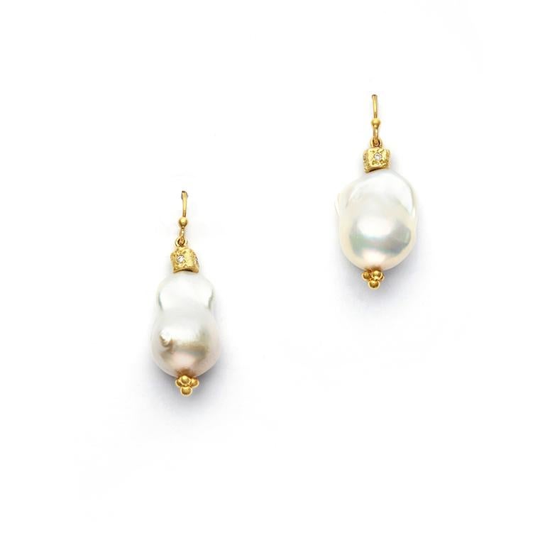 Feel like a Renaissance Beauty wearing these lustrous, large** 20 mm x 15mm South Sea Baroque Pearl and 18kt Gold and Diamond bead earrings.

**Pearl sizes may vary slightly 

