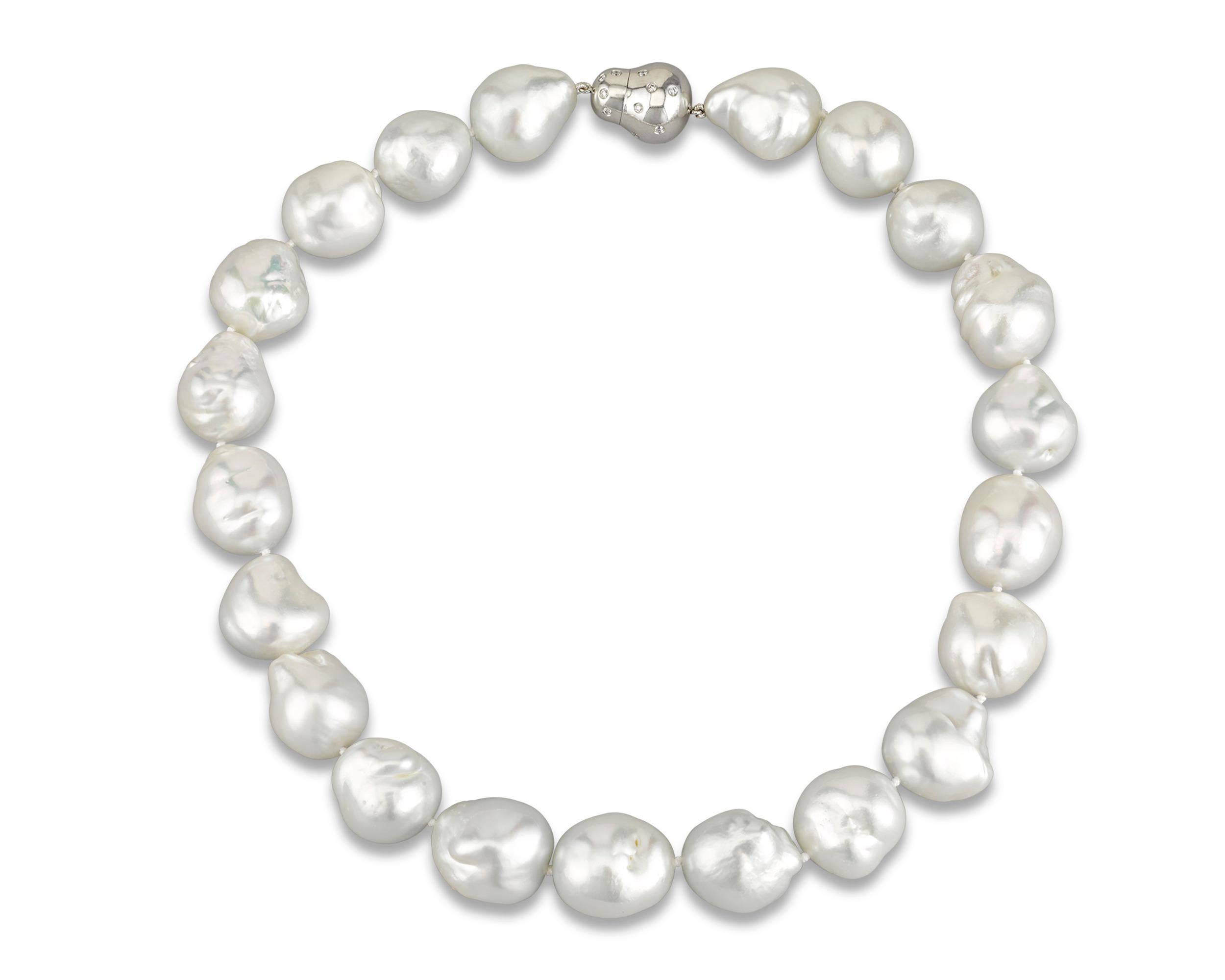 Exhibiting the unparalleled luster for which South Sea pearls are so prized, the white Baroque pearls in this necklace measure a remarkable 19.5mm to 18mm. South Sea pearls are among the rarest and most coveted in the world thanks to their large