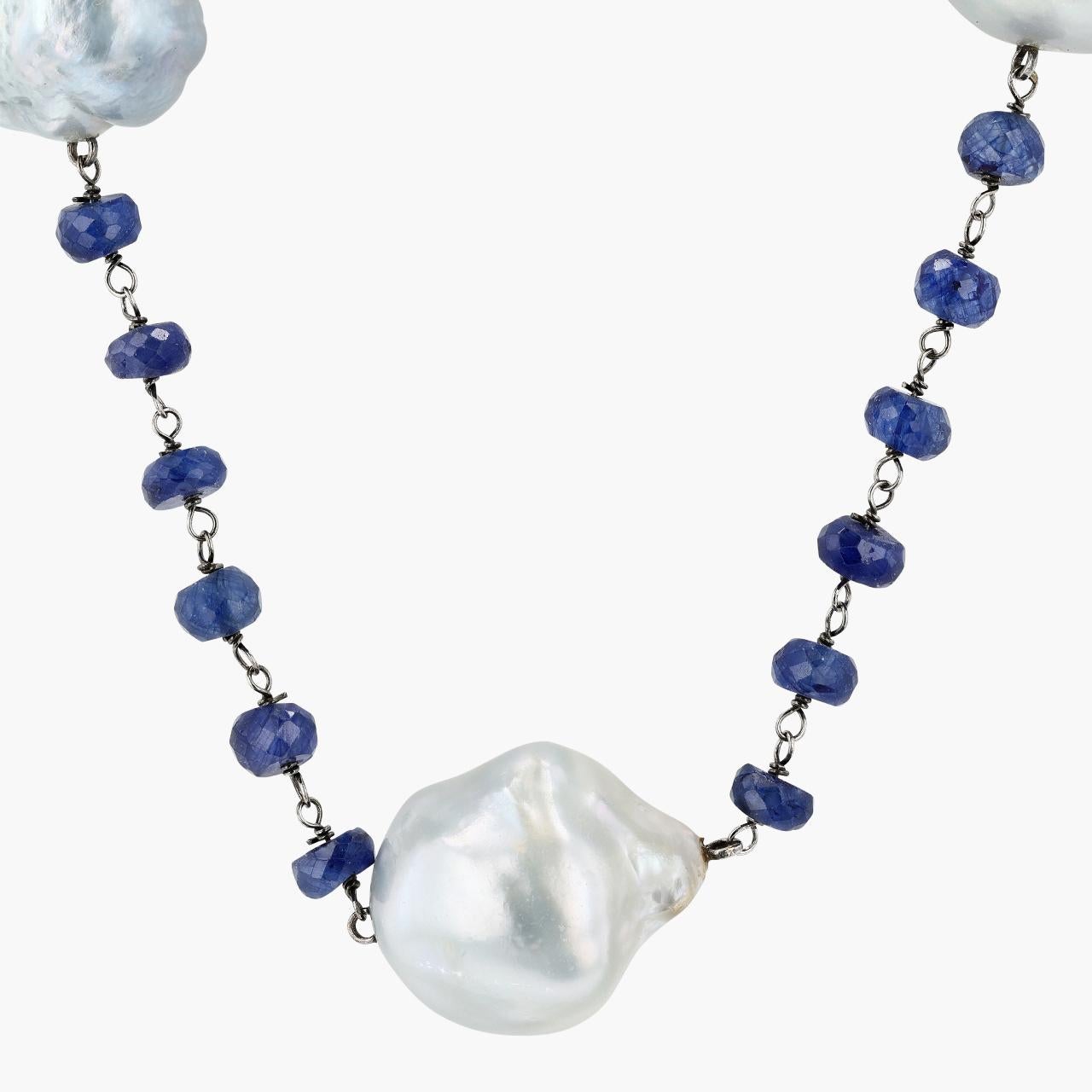 18kt White Gold, South Sea Baroque Pearl and Sapphire Rondelle Necklace by Yvel. The necklace features 11 South Sea Baroque Pearls and approximately 50ctw of Sapphire Faceted Beads. The gemstones are strung together with white gold wire. The