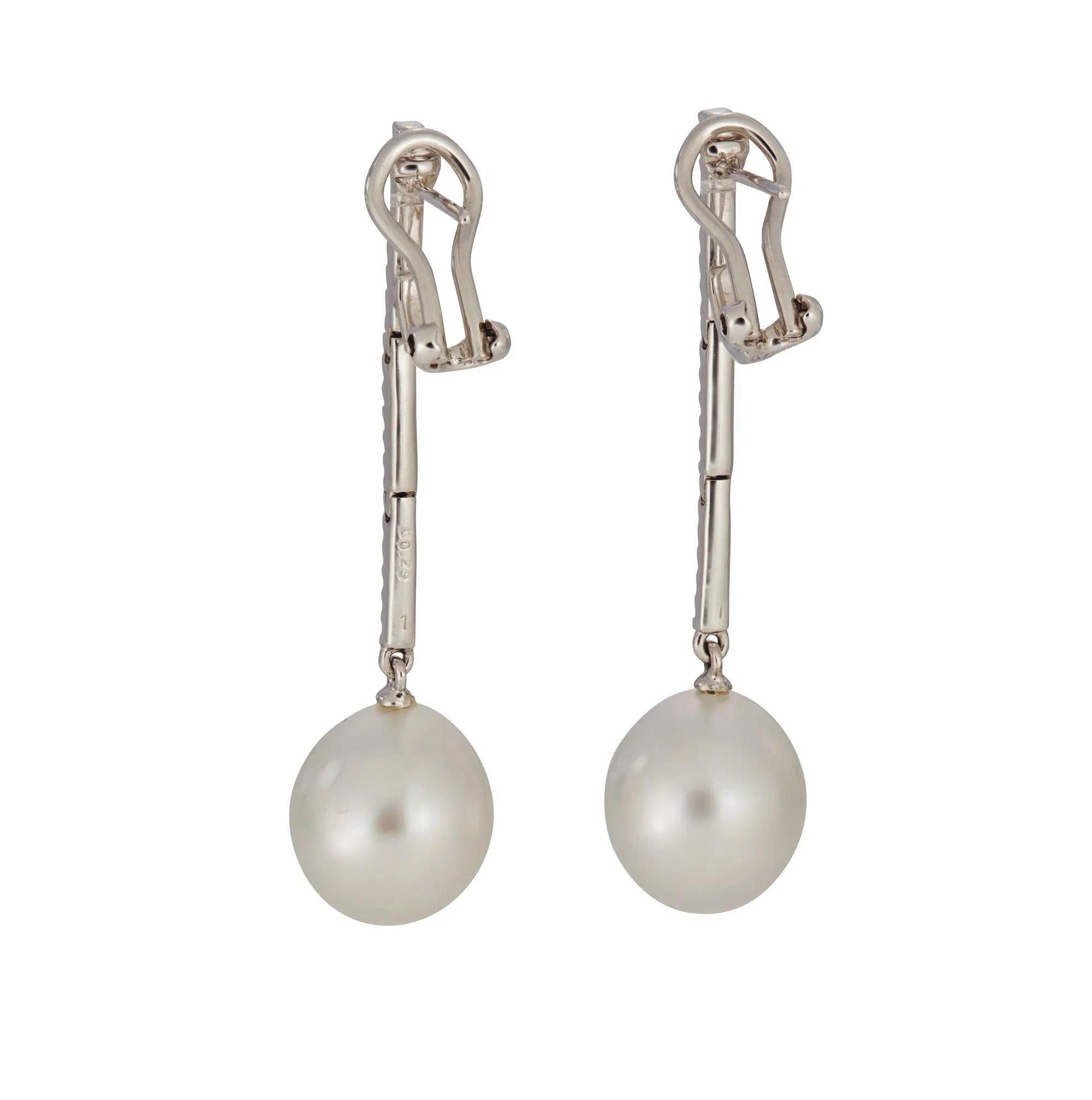 A Pair of South Sea Cultured Pearl 11.5mm 0.30ctw Diamond Pendant Drop Dangling 18k White Gold EARRINGS.
Brighten up your life and your lobes with these spectacular, and exceptionally beautiful, sleek and sexy pair of Gorgeous Diamond and South Sea