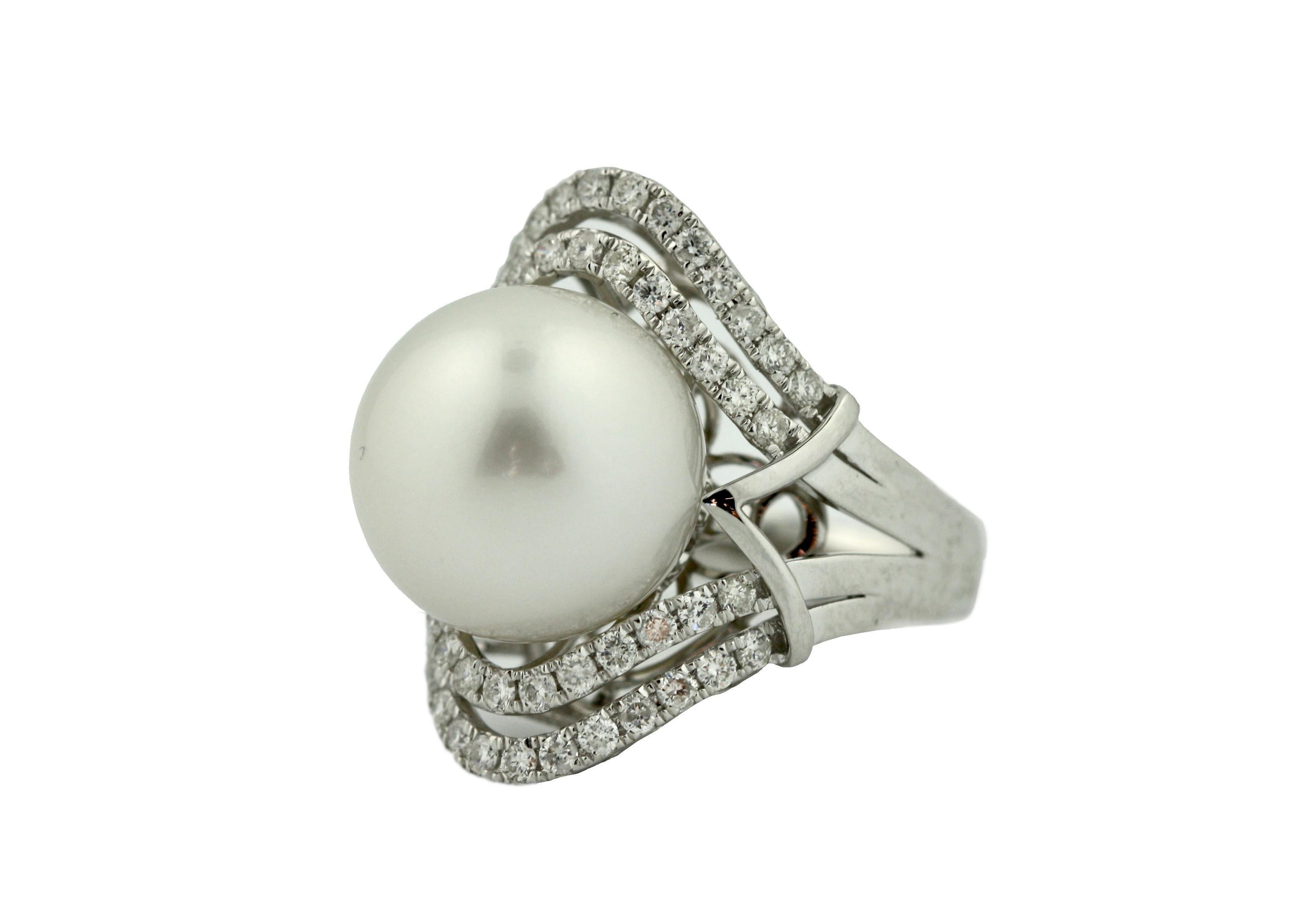 SOUTH SEA CULTURED PEARL AND DIAMOND RING
accompanied with
AIGL Report K29E99-EA13808 One polished, stamped, and tested 14K white gold ring with a bright finish. The ring is mounted with 1 genuine cultured South Sea Pearl and 54 genuine round