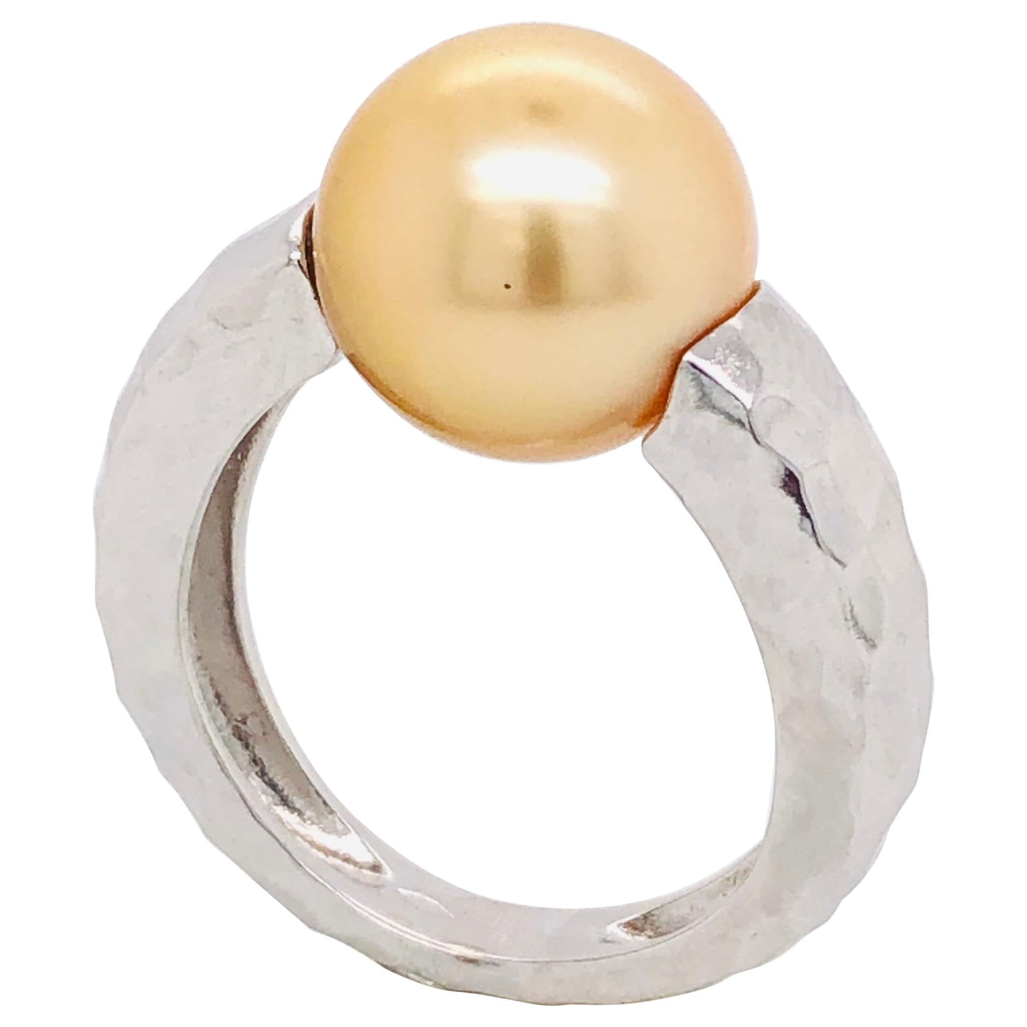 Bague mode en or blanc 18 carats avec perle de culture des mers du Sud sur or blanc