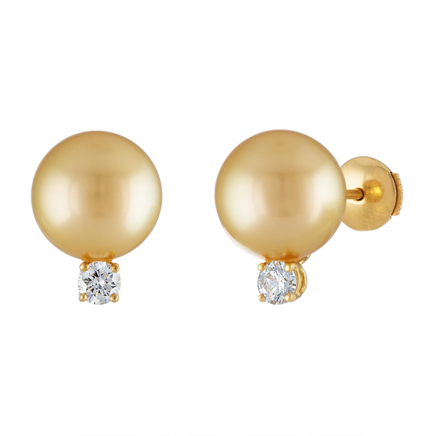 These elegant South Sea Pearl and diamond stud earrings consist of 11.7mm natural color Golden pearls set on 18K yellow gold accented by 0.47 carats of sparkling diamonds.
These South Sea pearls feature very clean surface and high luster.
This is a