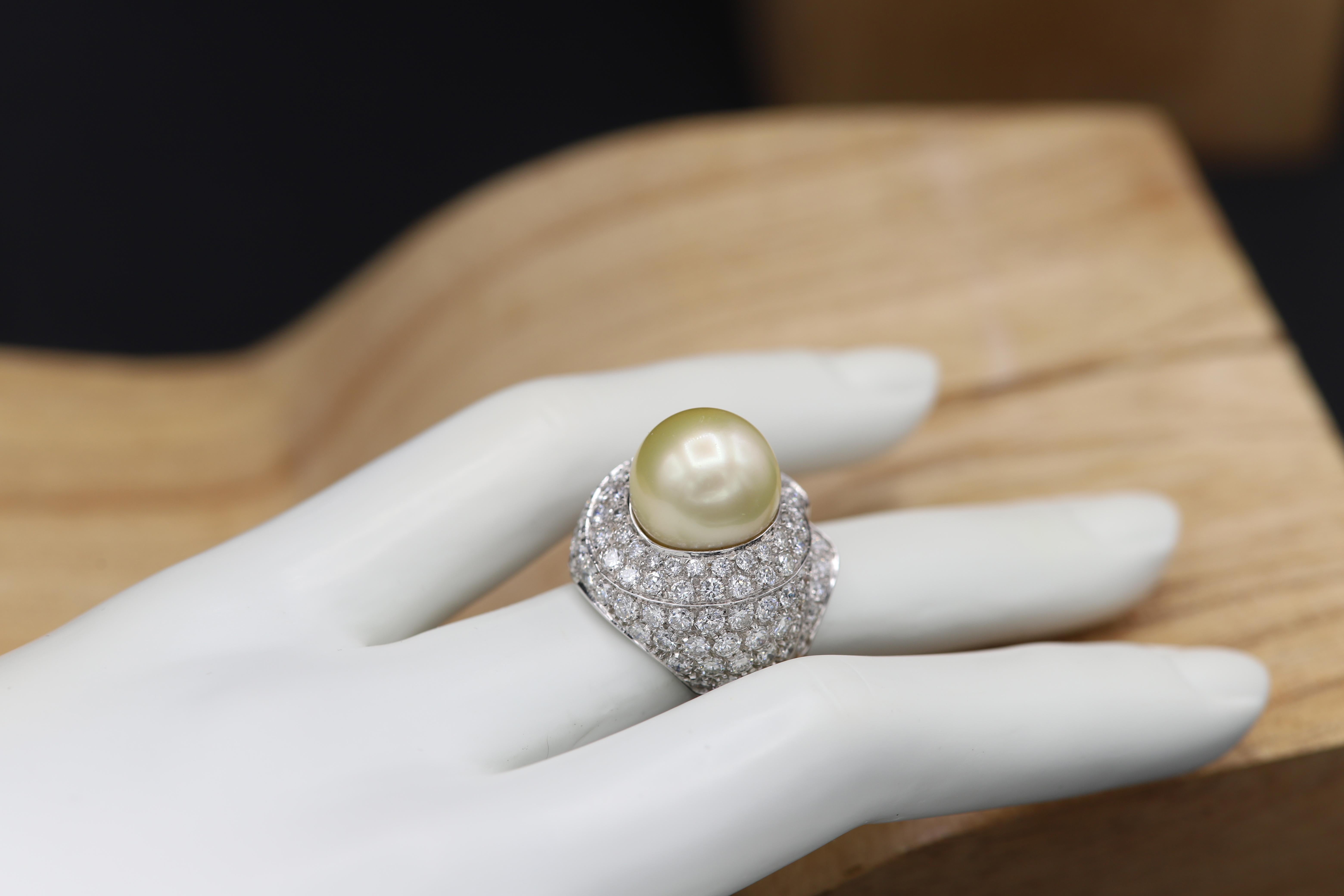 Impressive large Pearl and large diamond ring, 
14mm yellow/golden pearl from south sea.
18k white gold 15 grams,
Round Natural Diamonds Total 5.0 carat G- VS.
Finger size 6.75
resizable: only a little bit up or down
(#249 Liq 19448519)
