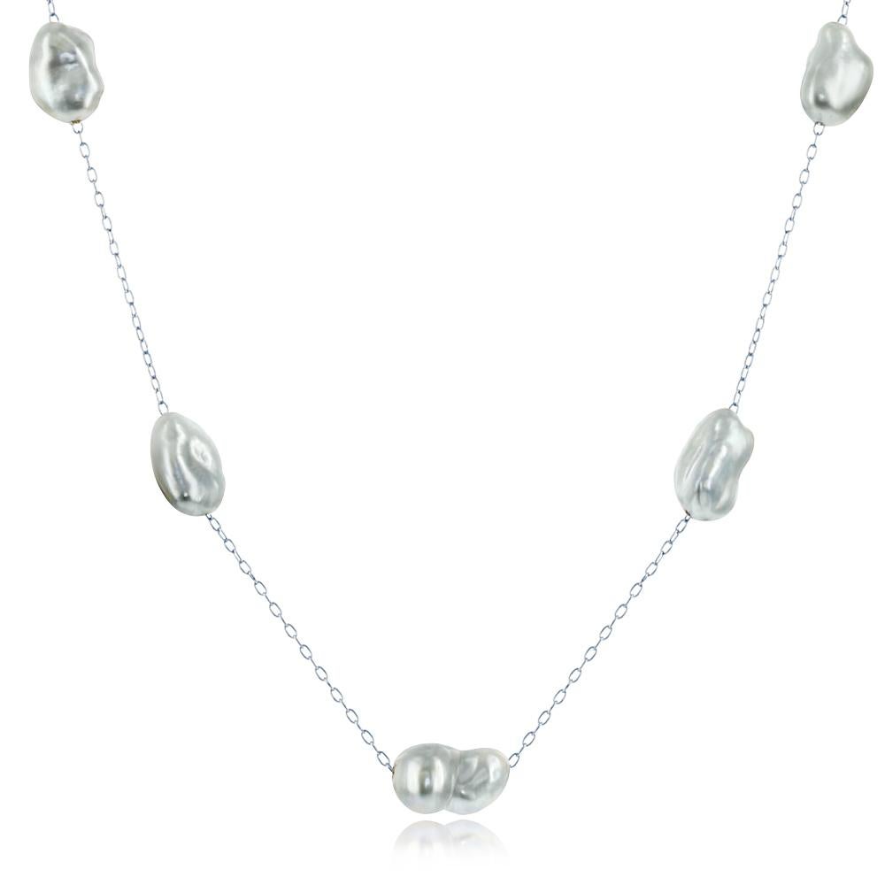 This sterling silver tin-cup necklace features South Sea gray, cultured keshi pearls. The pearls measure 6-7mm., while the finished necklace measures 18 inches. 
AN ELEGANT EXPRESSION – This gorgeous cultured pearl jewelry adds a luminous glow to