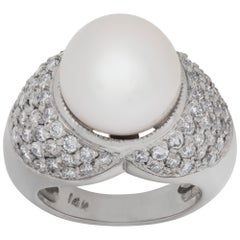 South Sea pearl (12 x 12.5mm) 
diamonds ring set in 14k white gold.