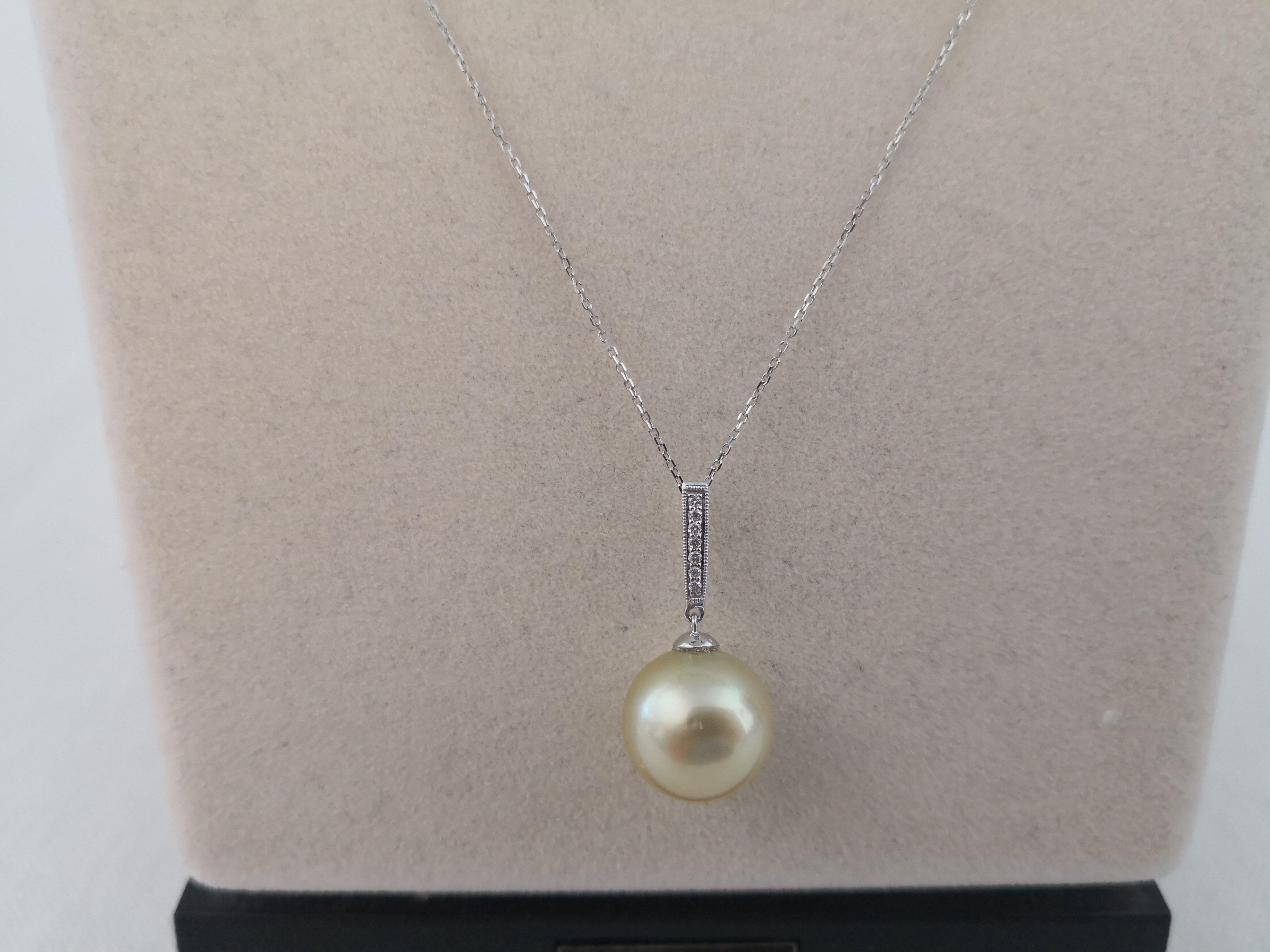 Contemporary South Sea Pearl, Golden Color, Diamonds, 18 Karat Gold For Sale