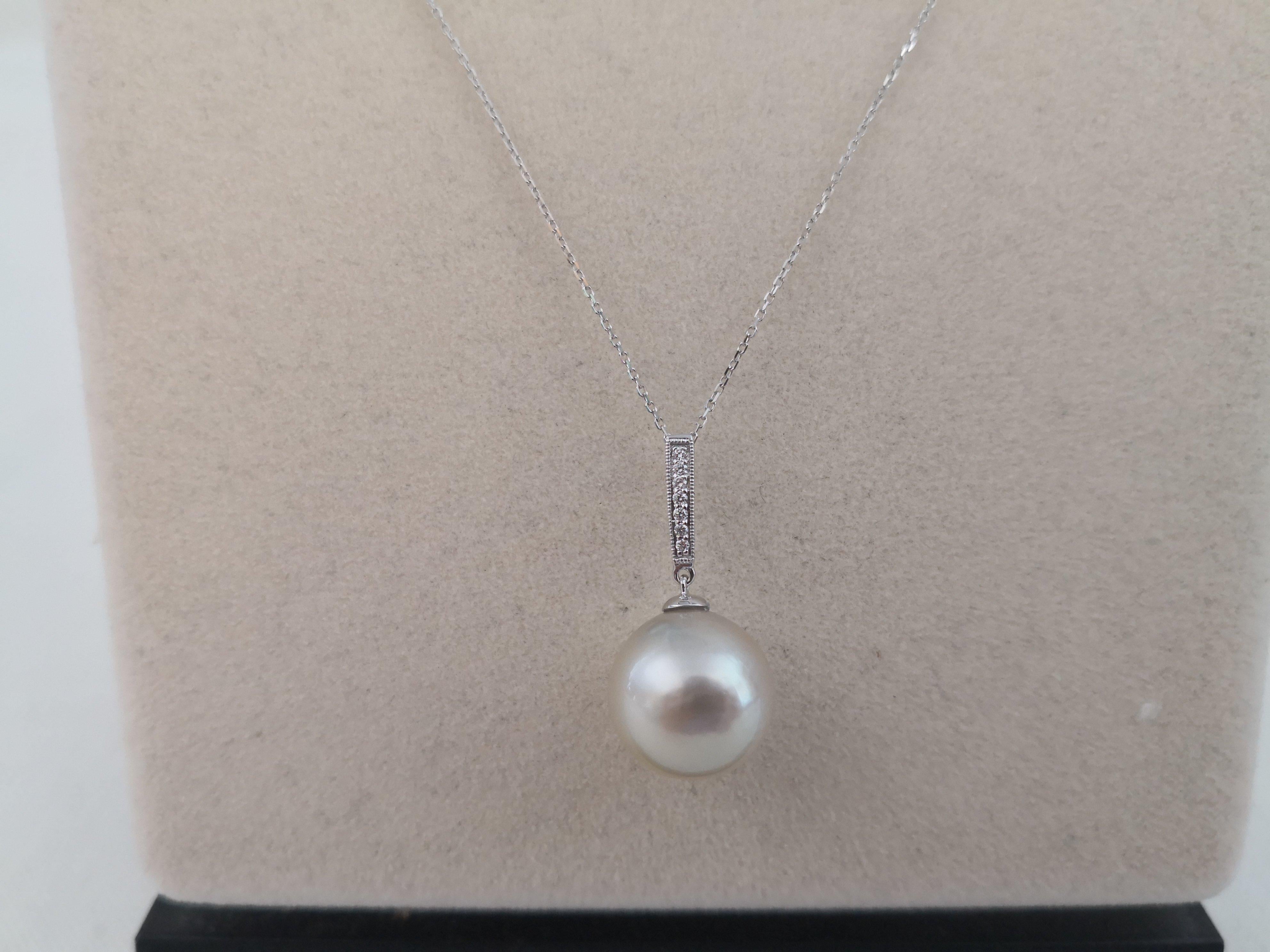 A Natural Color South Sea Pearl Pendant necklace

- Size of Pearl 13 mm mm of diameter

- Pearl from Pinctada Maxima Oyster

- Origin: Indonesia ocean waters

- Natural White Color pearl

- Natural luster and orient

- Pearls of Near Round shape

-